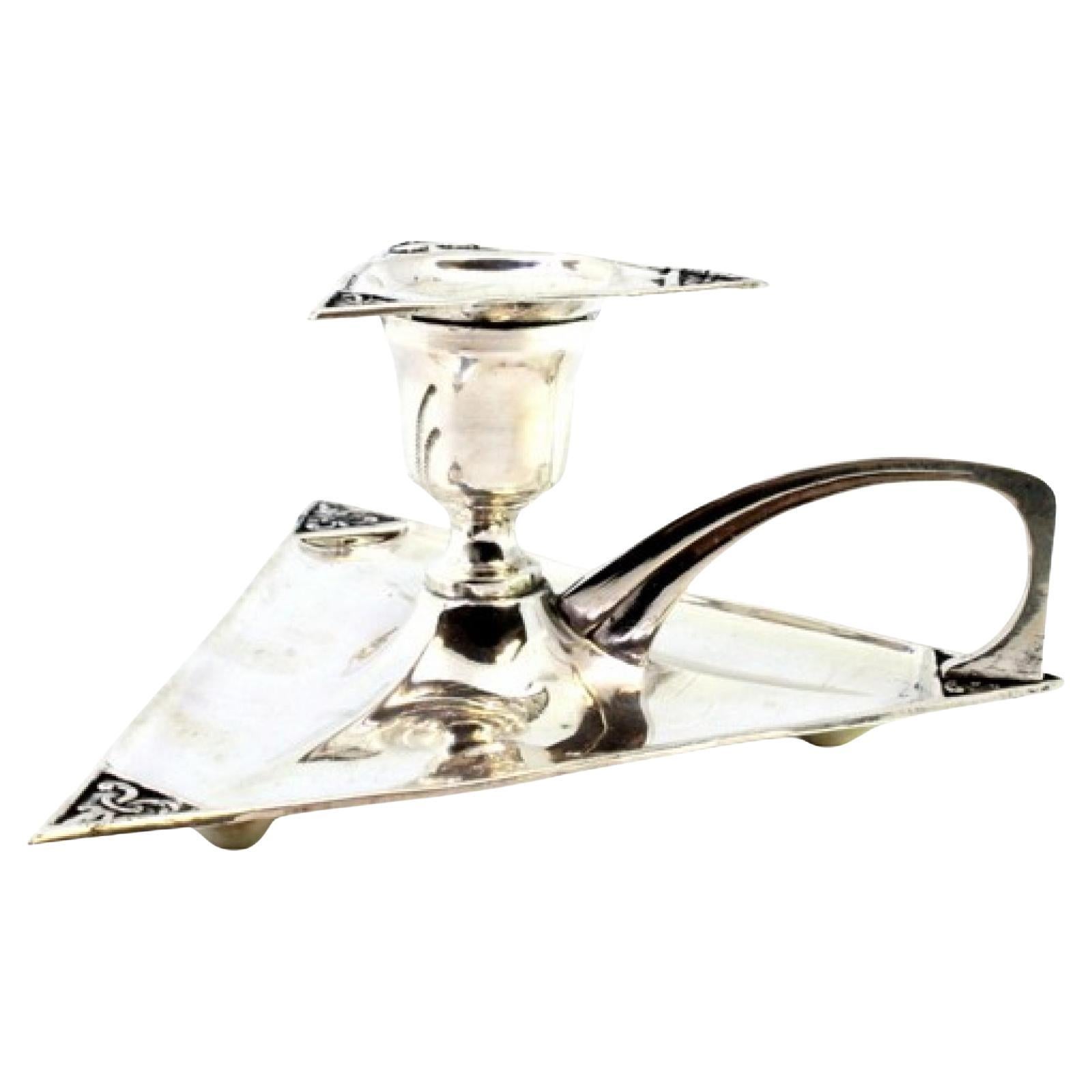 Triangular shaped silver paddle For Sale