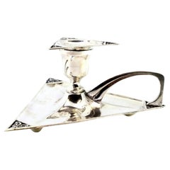 Triangular shaped silver paddle