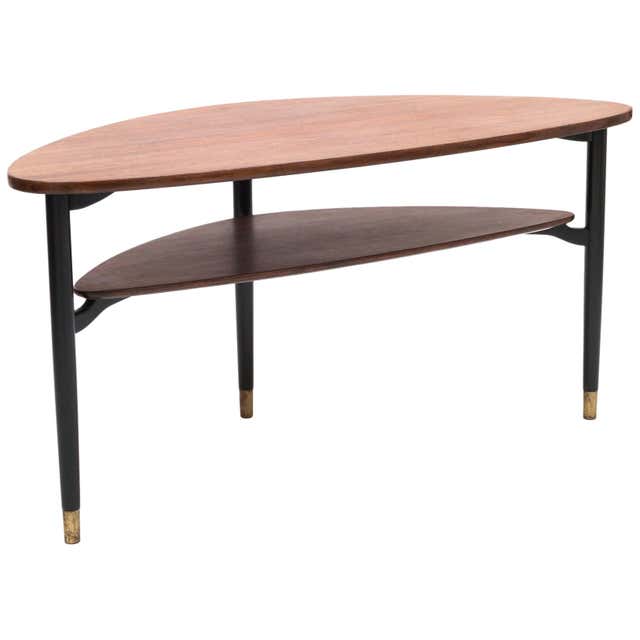 Danish mid century modern triangular teak coffee table. at 1stDibs