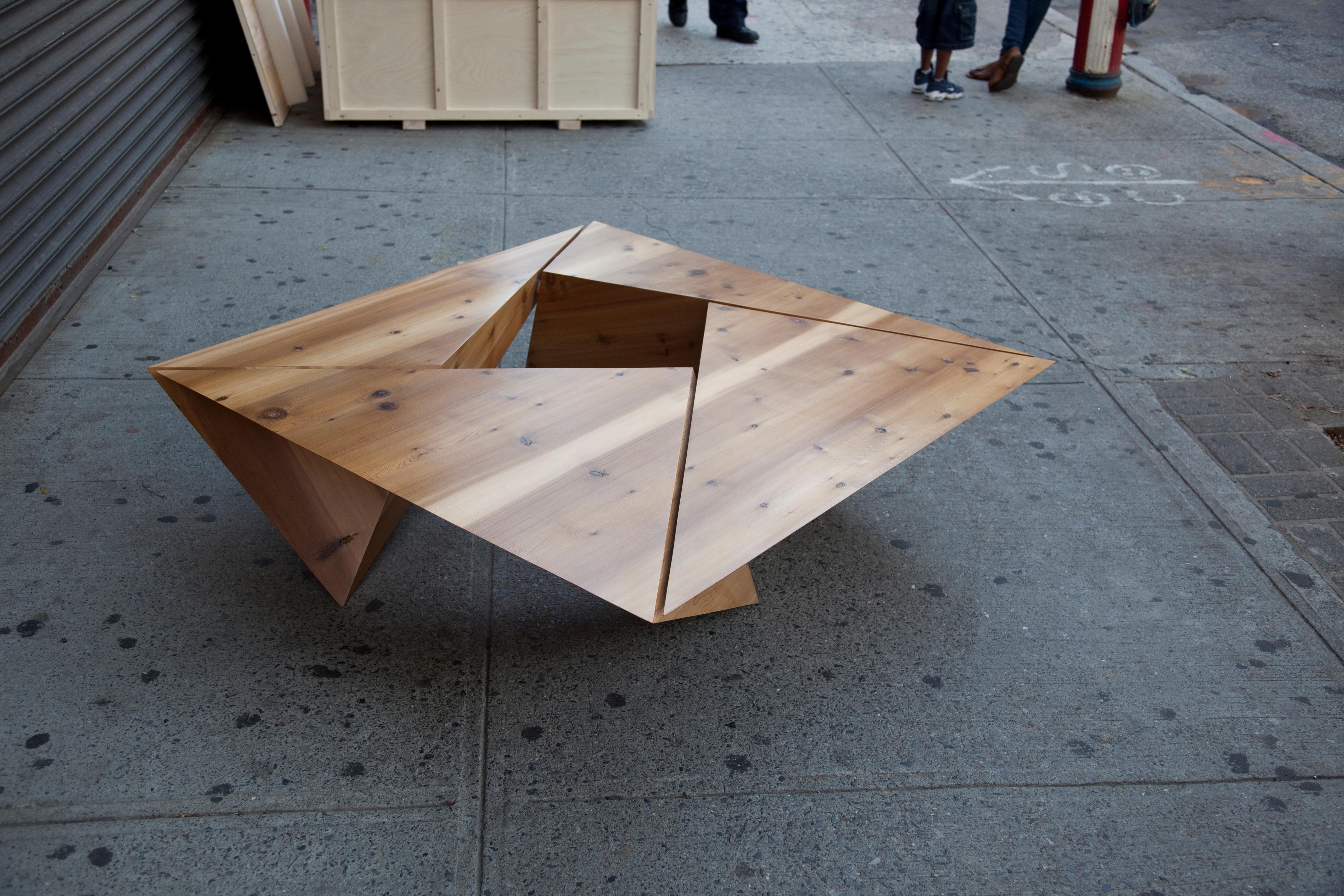 “Triangulated” is a coffee table made from four irregular tetrahedrons that lean on each other to create a perfect square in plan view. Held together with wooden hardware, it combines traditional Japanese joinery with its modern design.

Available