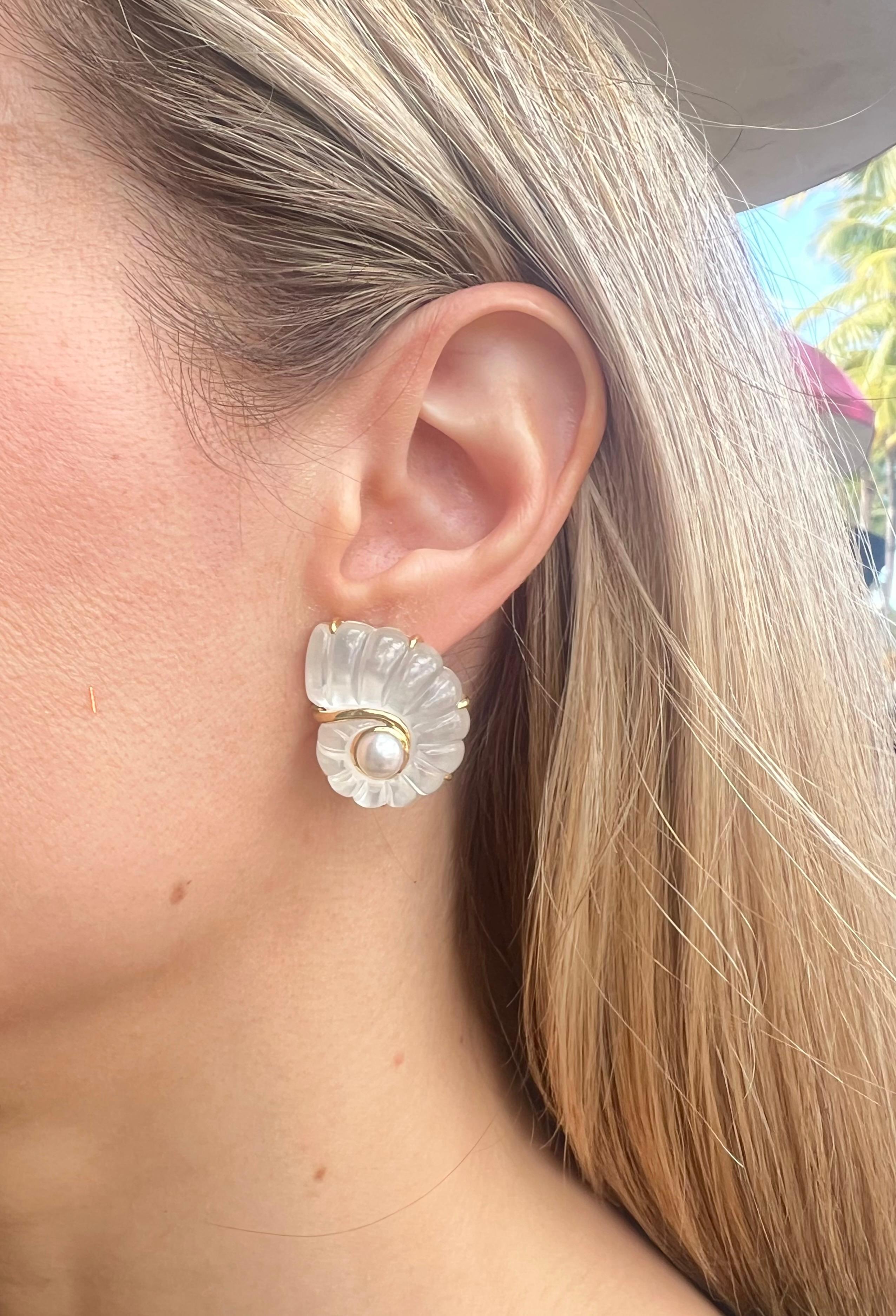 Trianon carved rock crystal nautilus shell earrings in 18k yellow gold with 5.8mm cultured pearls at center.  Clip backs (posts may be added upon customer request).  1