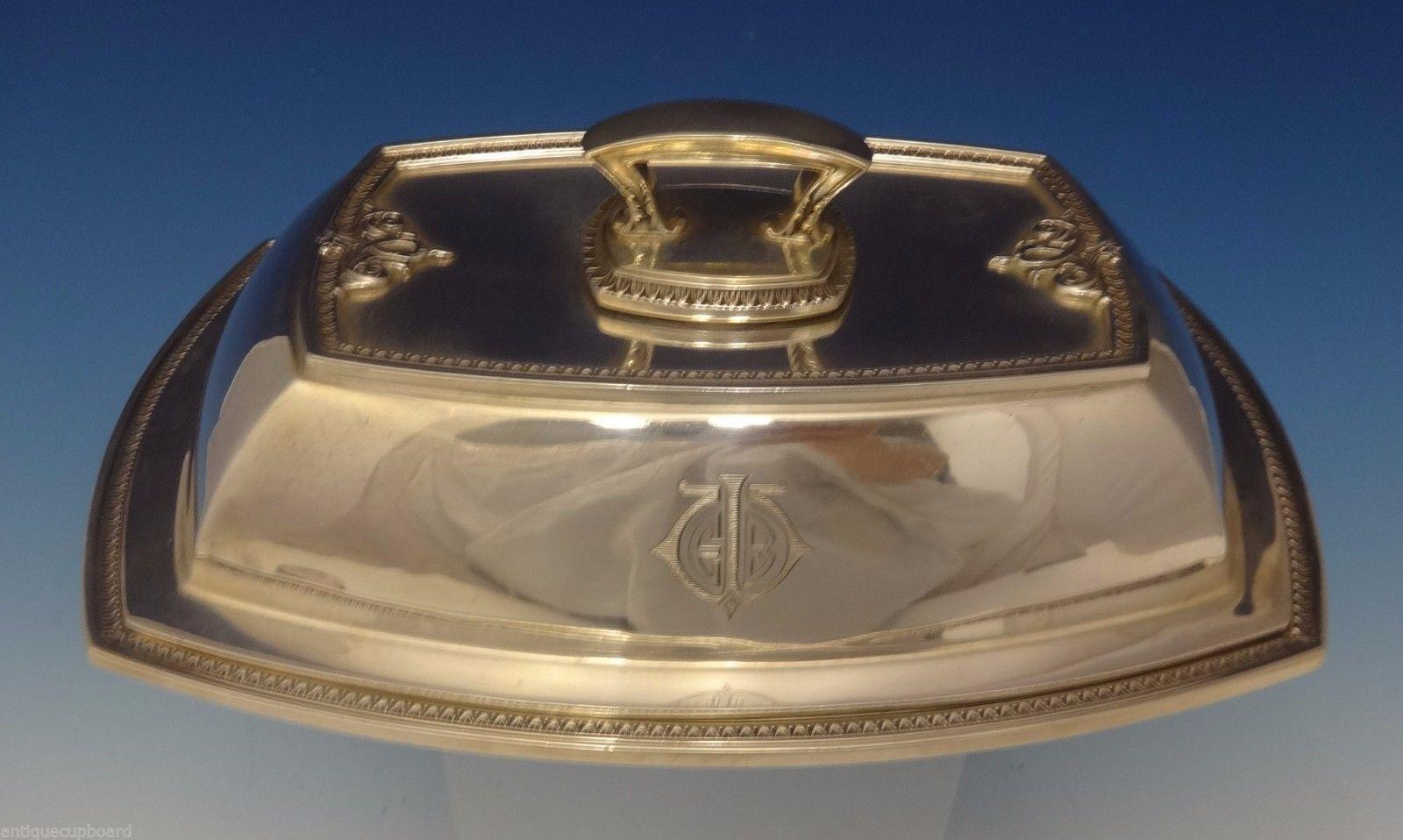 Trianon by International
Art Deco Trianon by International sterling silver covered vegetable dish. It has a removable handle to make two bowls. The piece has an EB monogram and it's marked with #X105-1 and 4. It measures 5 tall with the cover, 9