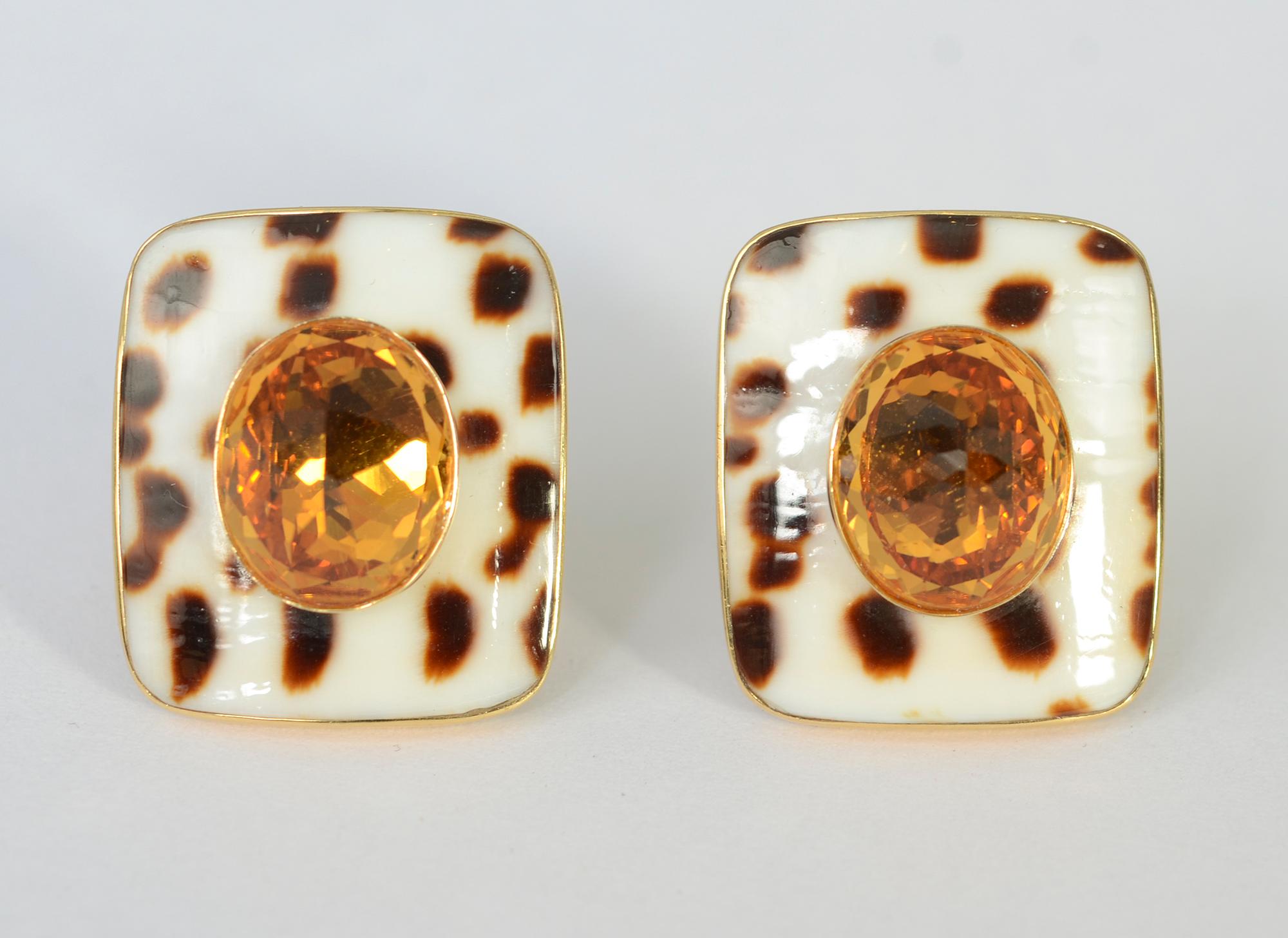 Faceted citrines blend beautifully with the brown and white patterning of the shell ground in these earrings by Trianon. The brown patterning is irregular because it is natural shell. The earrings are 3/4