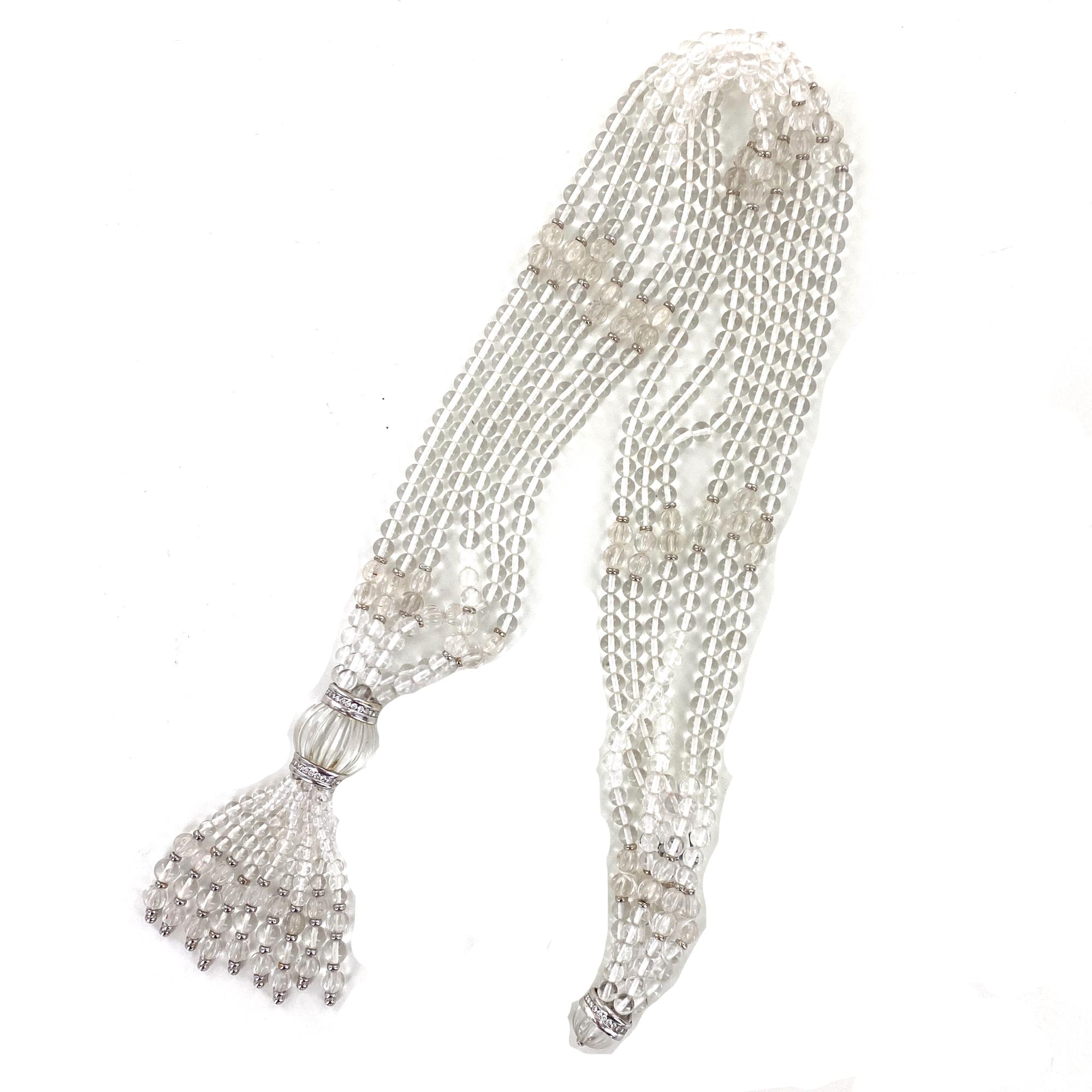 Fabulous crystal bead and diamond necklace by Trianon. The versatile multi strand necklace can be worn many different ways (see photos). The necklace measures 18 inches in length and the tassel segment measures 3.0 inches in length. Round brilliant