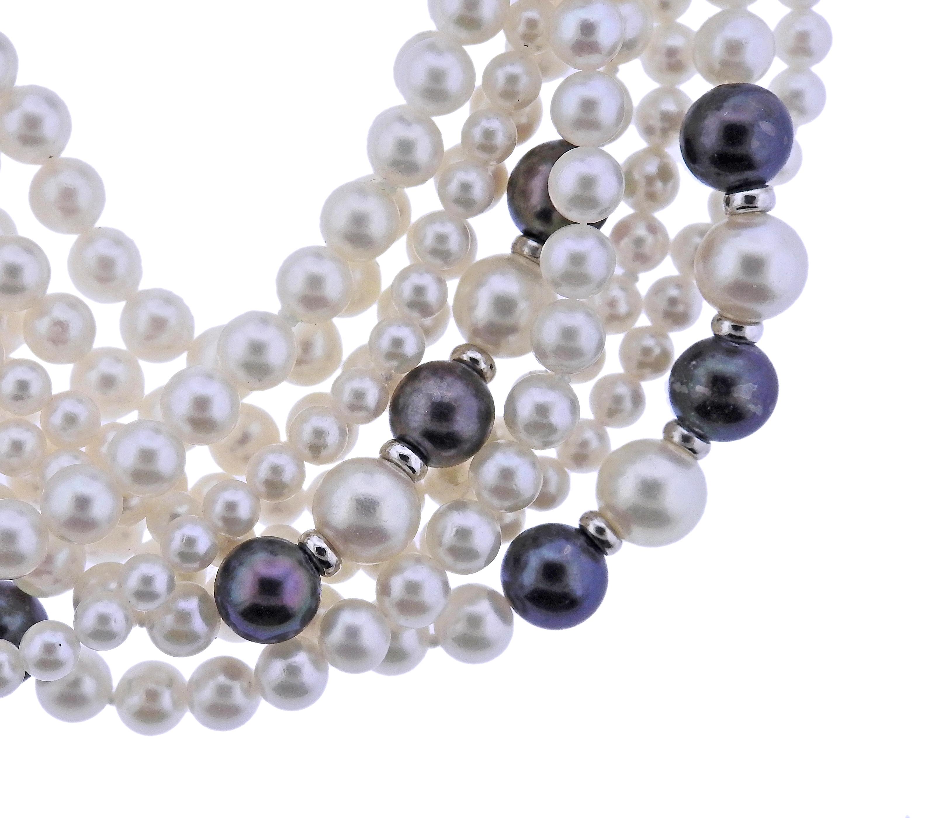 18k White Gold , 
Gemstones: diamonds Saltwater Pearls - 3.5mm To 8.5mm In Diameter 
Diamonds - Approx. 0.30ctw Clarity: Vs Color: H 
Measurements: Bracelet 8.5
