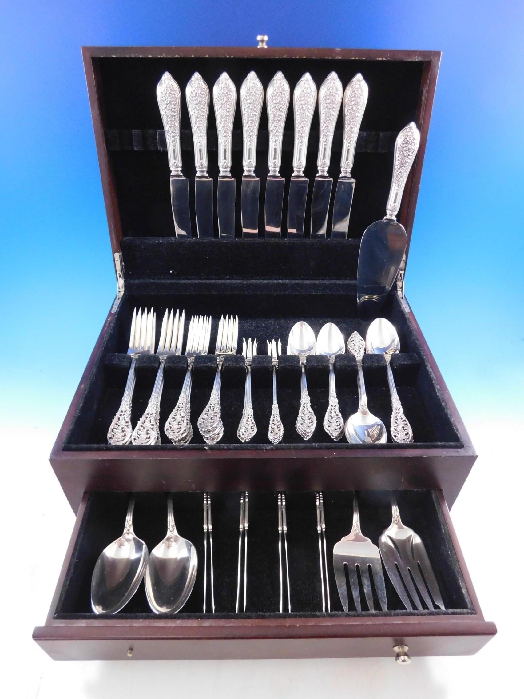 Beautiful dinner size trianon pierced by Dominick and Haff flatware set, 61 pieces. This set includes:

8 dinner knives 9 3/4