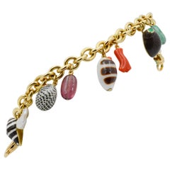 Bracelet en or jaune 18 carats avec breloque coquillage trianon