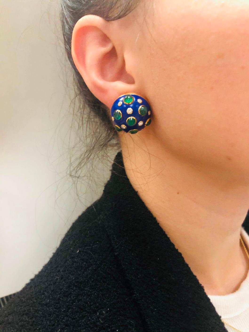 Colorful and wearable earrings created by Trianon in the 1970s. 
Made of 18 karat yellow gold, lapis lazuli, bezel set cabochon emeralds and round brilliant cut diamonds (G-H color, VS clarity, approximately 1.0 carat total weight).
Measurements: 1