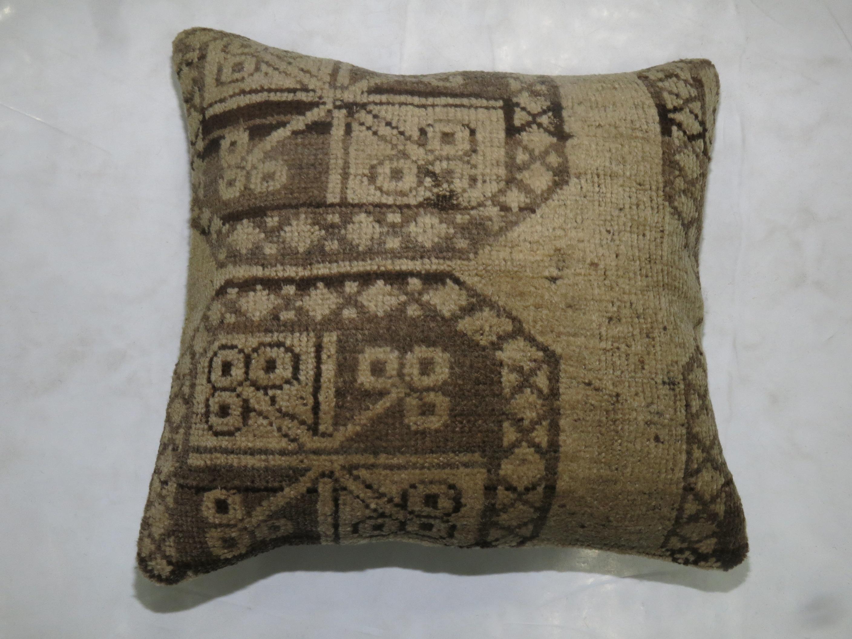 Large pillow made from an early 20th century antique Afghan Ersari rug with cotton back. Polyfill zipper closure provided

Size: 17