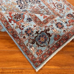 Serapi Rug Gallery’s 4' x 6' Hand-Knotted Wool Tribal Area Rug