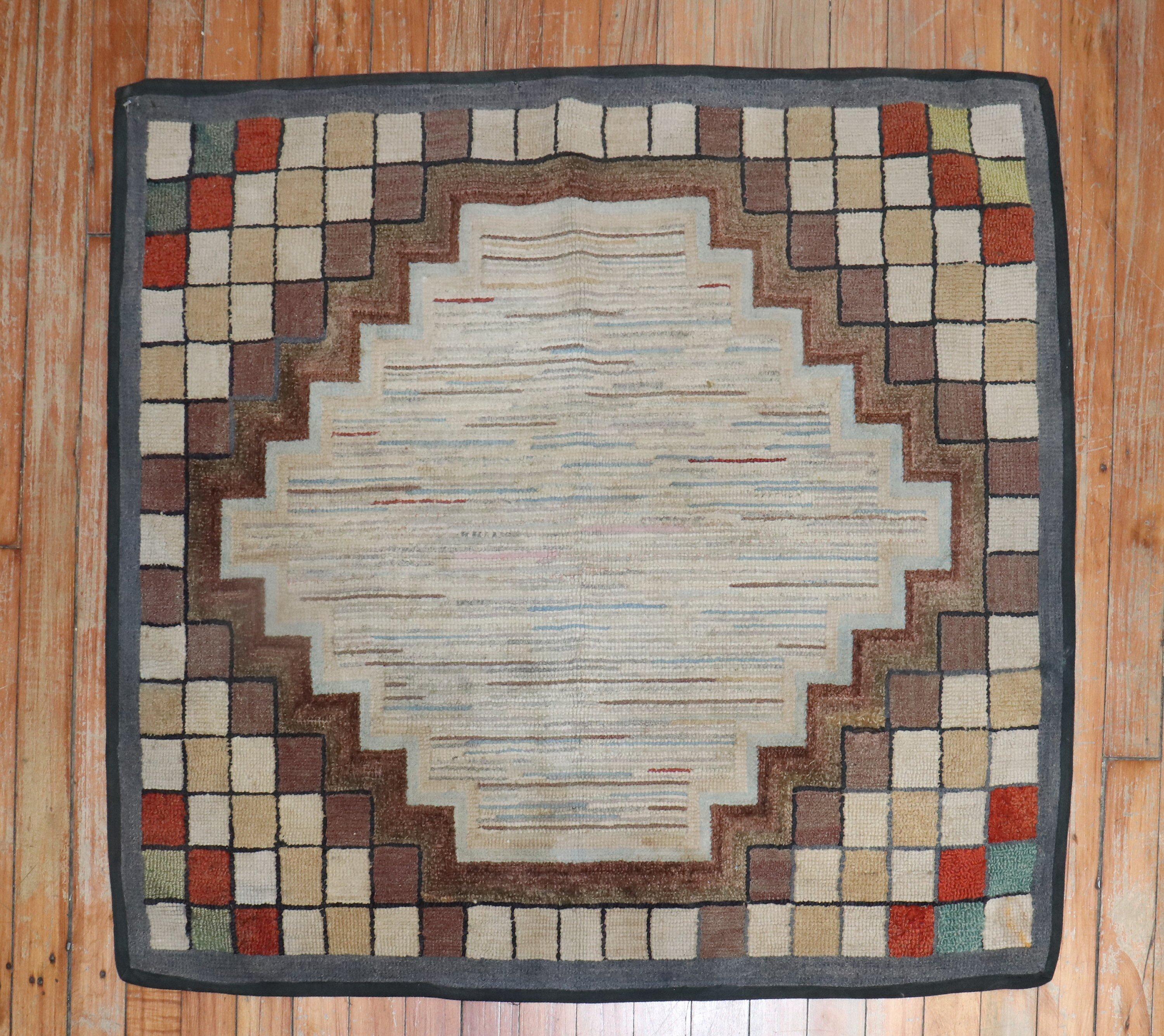 A handmade decorative American hooked square size rug from the middle of the 20th century 

Measures: 2'10