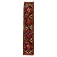 Runner tribale antico in lana Heriz fatto a mano con campo multicolore