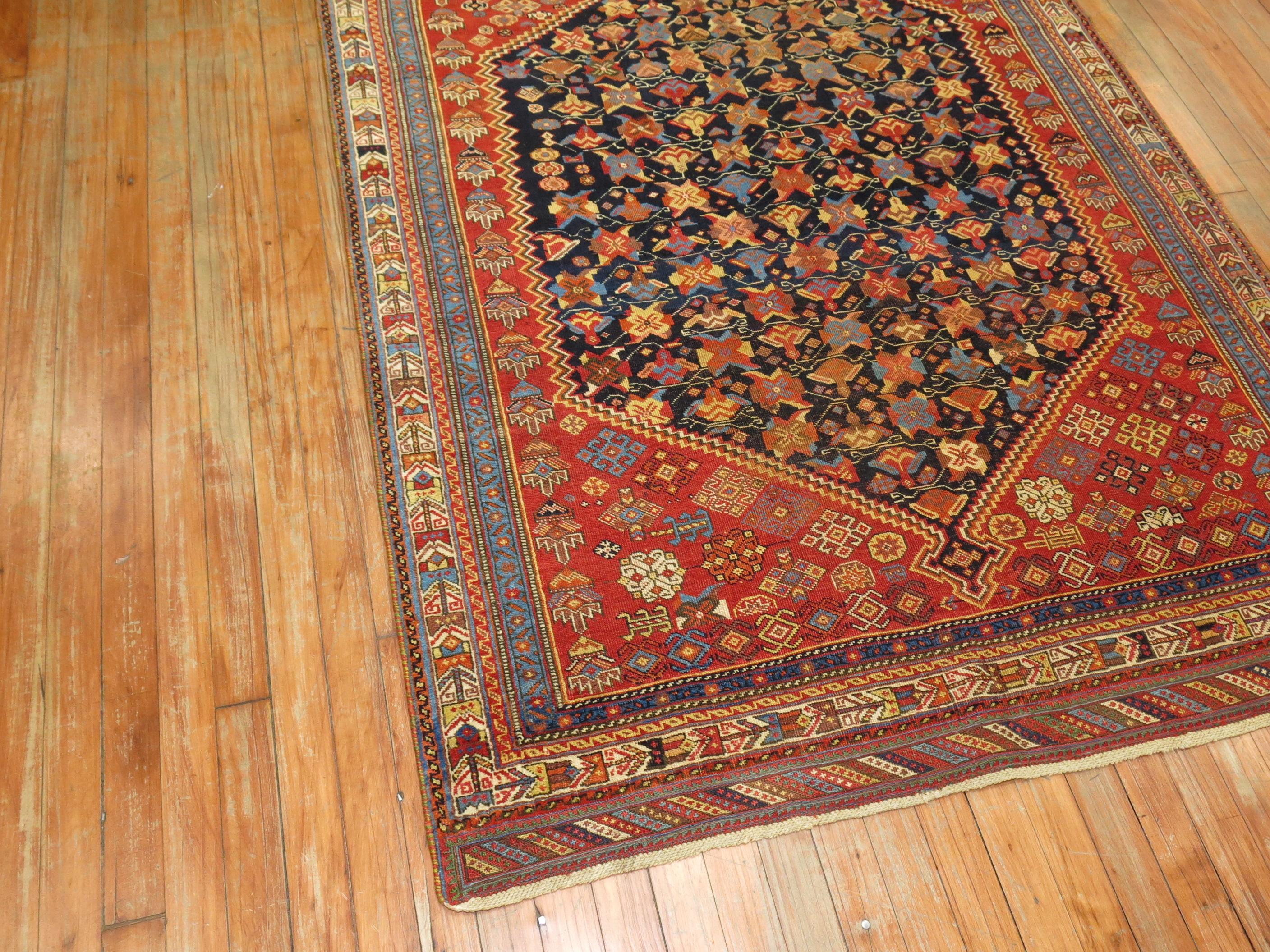 an early 20th century Tribal Jazzy color Persian Afshar rug. Lively crispy colors. The quality on this one is the finest of its type.

Measures: 4'3'' x 6'

High-quality antique Afshar rugs display deeply saturated dyeing techniques, and they