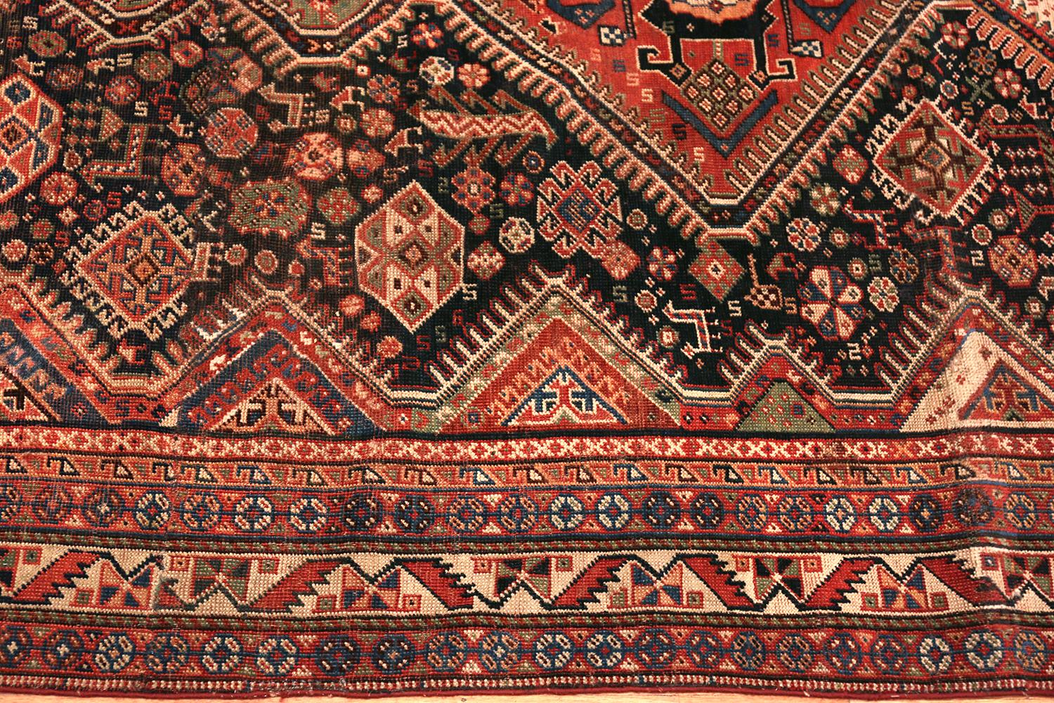 A beautifully Tribal antique Persian Qashqai rug, country of origin / Rug type: antique Persian rugs, date circa 1920.

Size: 4 ft 10 in x 7 ft 5 in (1.47 m x 2.26 m).