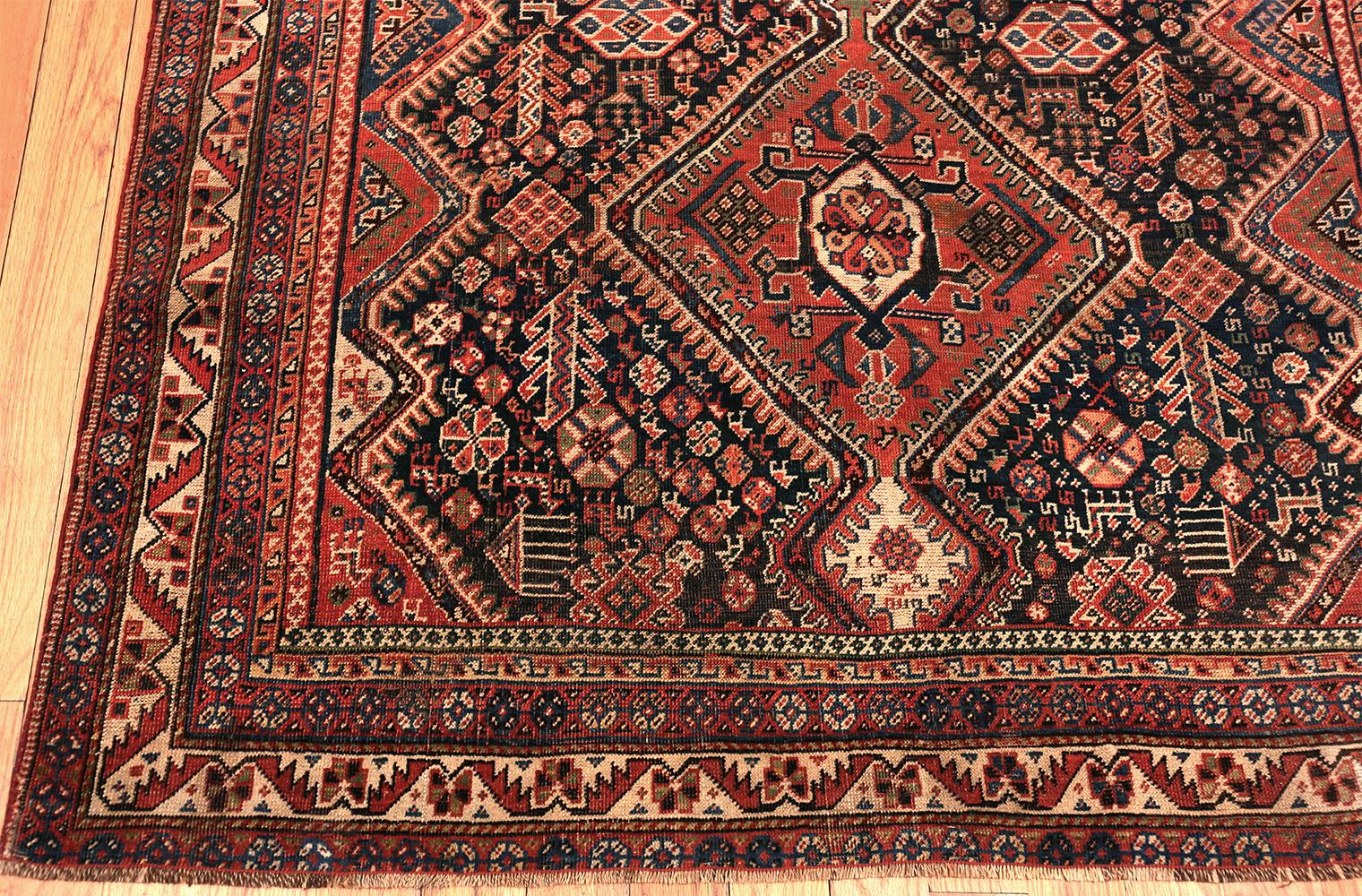 Tribal Antique Persian Qashqai Rug In Fair Condition In New York, NY