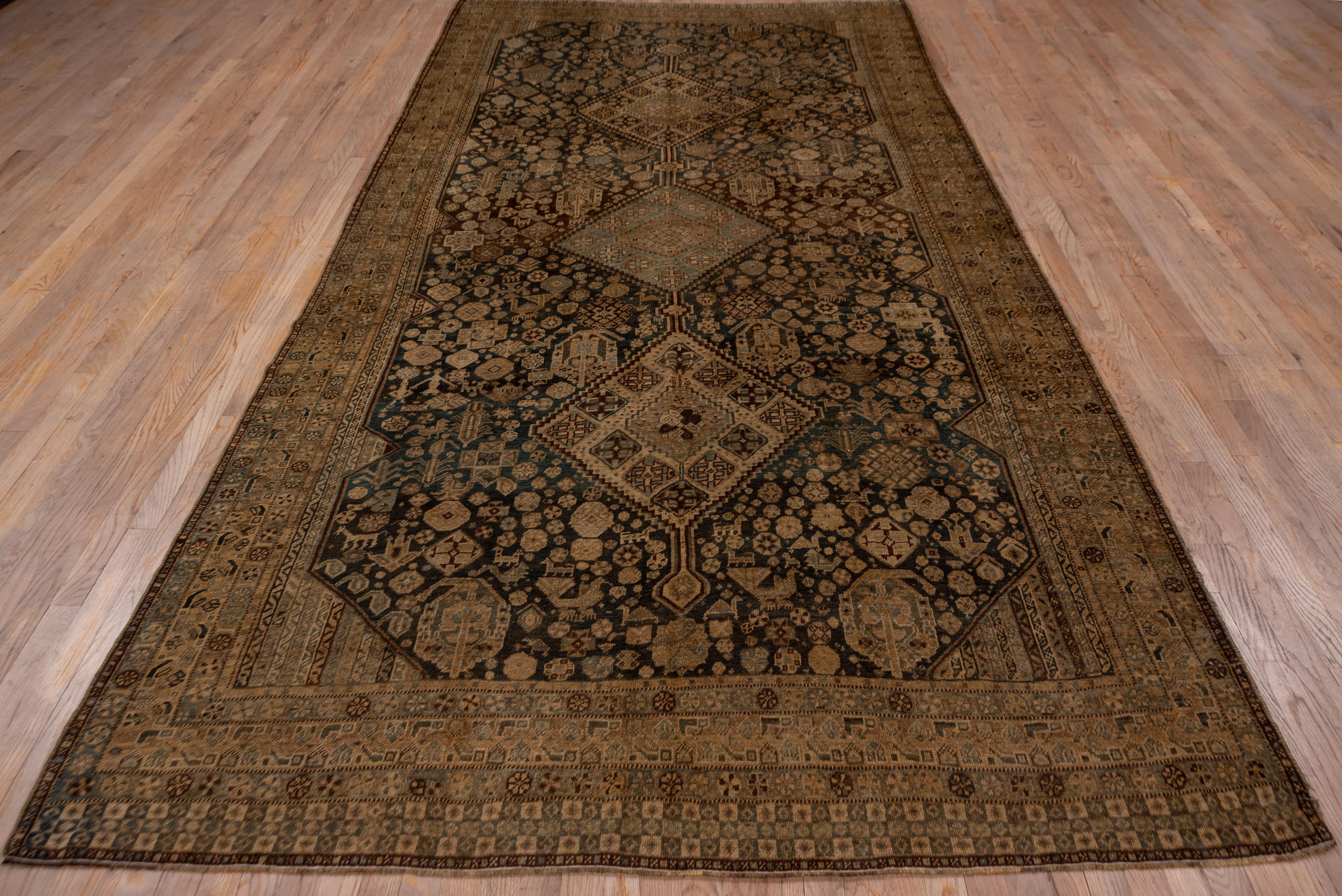 Hand-Knotted Tribal Antique Persian Shiraz Gallery Rug, circa 1920s For Sale