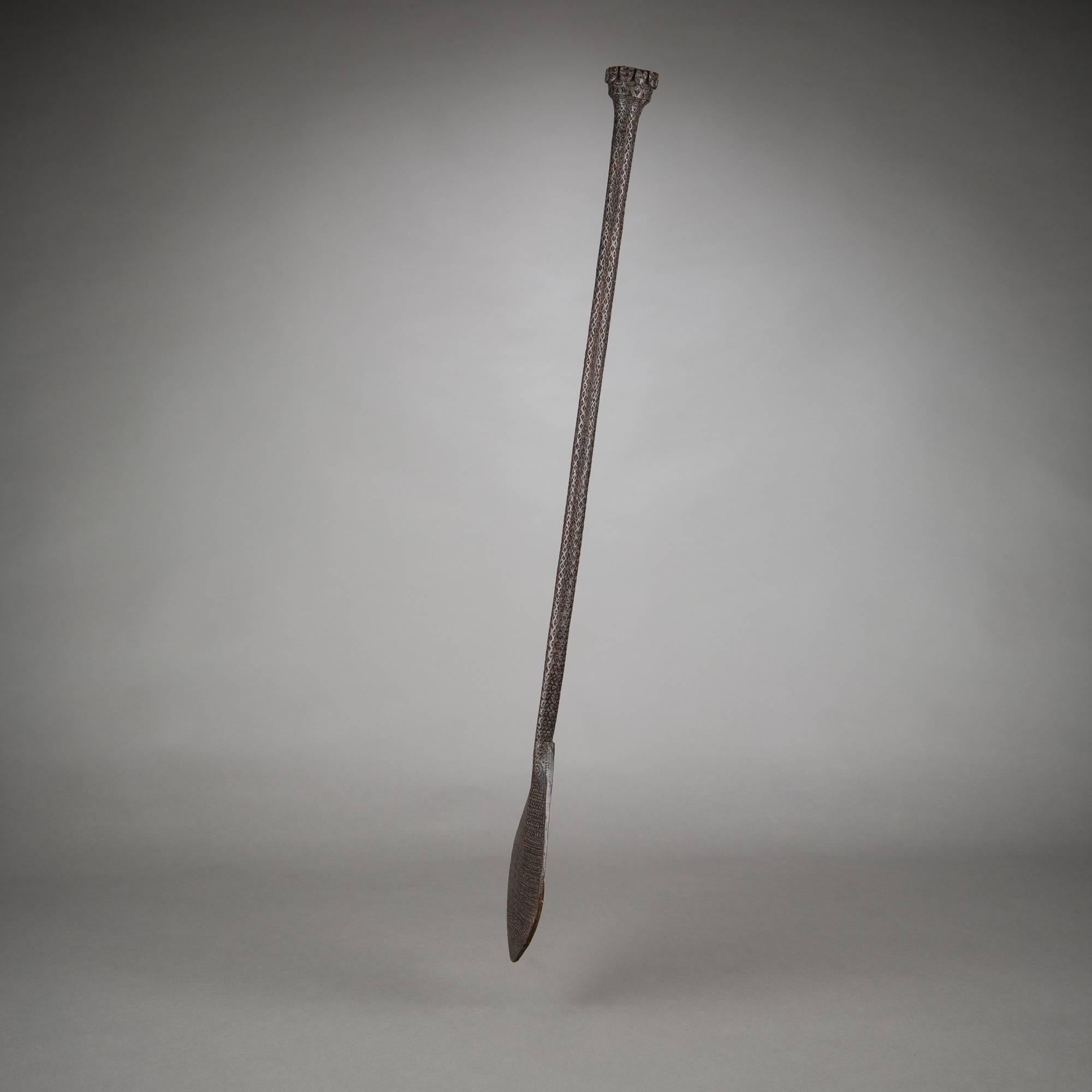 A classic Austral Islands paddle featuring the intricate surface carving for which these objects are renowned. Ceremonial paddles are icons of Austral Islands art, and although their original purpose is not clear, they were likely used as dance