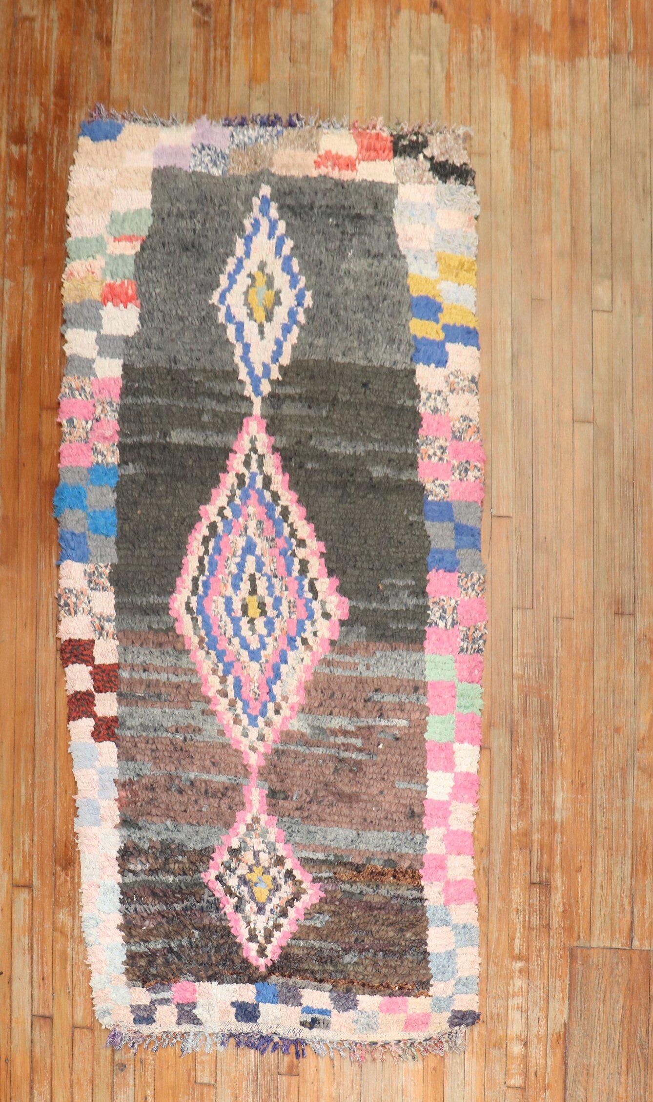 Mid-20th century Moroccan tribal rug

Measures: 3'10'' x 8'.
