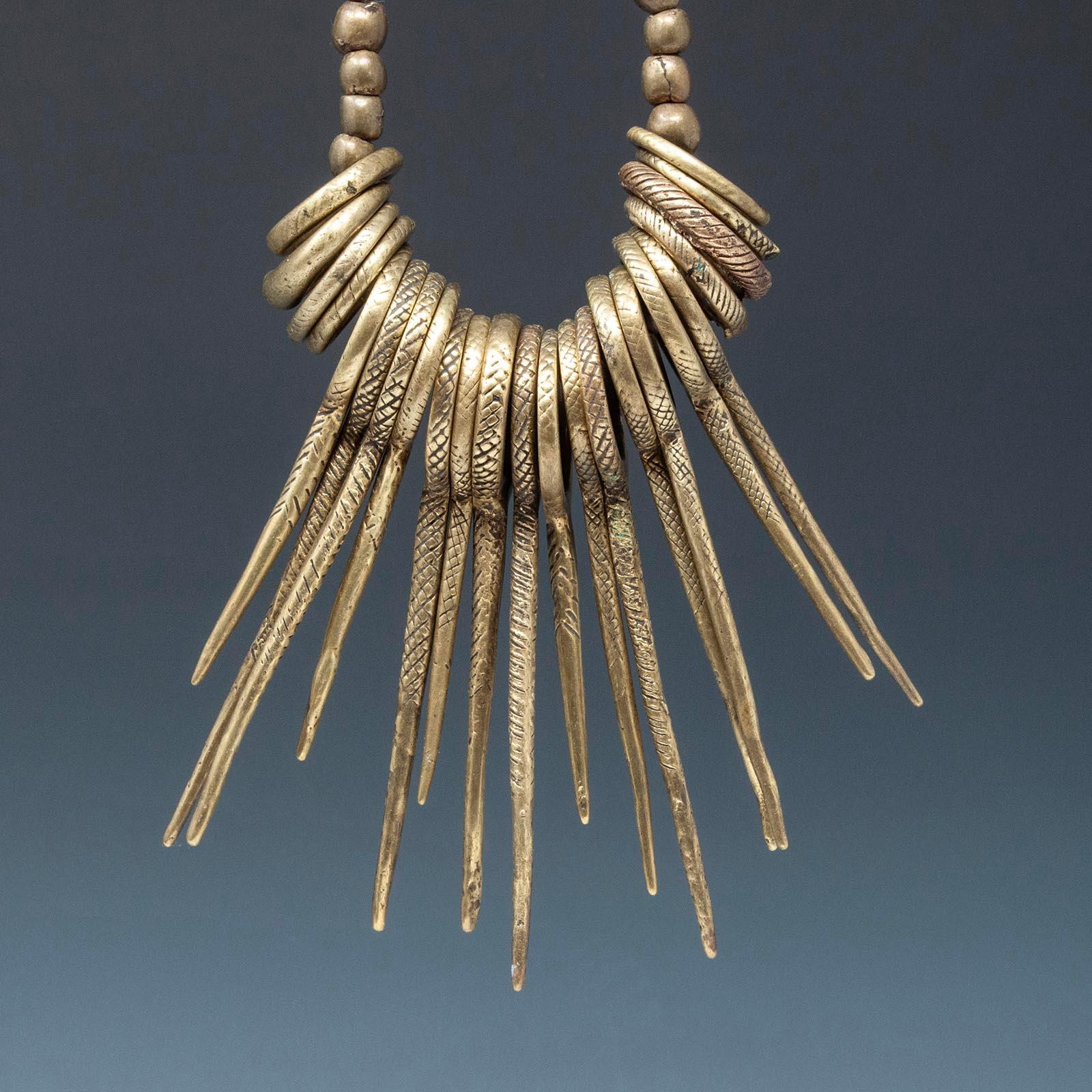Tribal Bronze Cache-sexe, Vere People, Cameroon/Nigeria
Bronze alloy
4.5 (11.4 cm) to 2.25 (6.7 cm) inches high
Late 19th century

A set of bronze spikes forms this cache-sexe from the Vere people of Cameroon/northern Nigeria worn by young girls