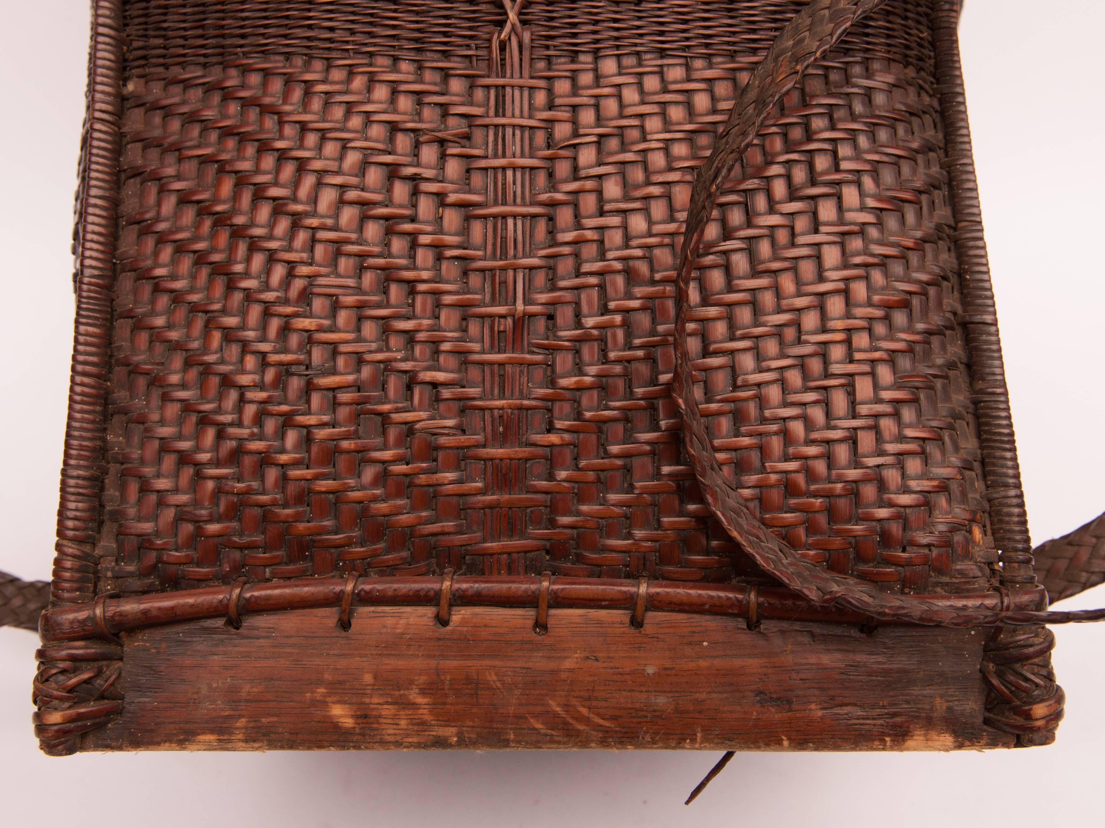 Tribal Carrying Basket from Laos, Mid-20th Century, Bamboo, Rattan, Wood Base In Good Condition In Point Richmond, CA