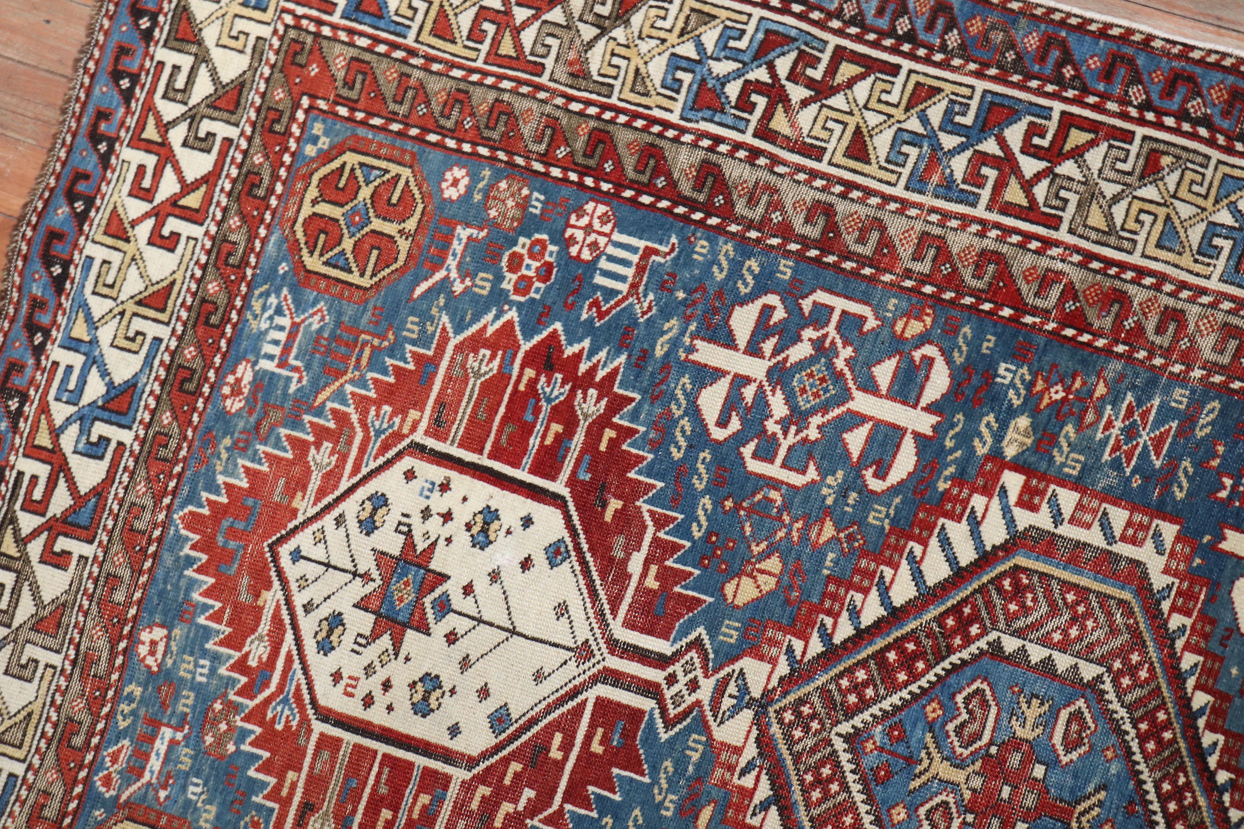 Wool Zabihi Collection Tribal Blue 19th Century Antique Caucasian Shirvan Rug For Sale