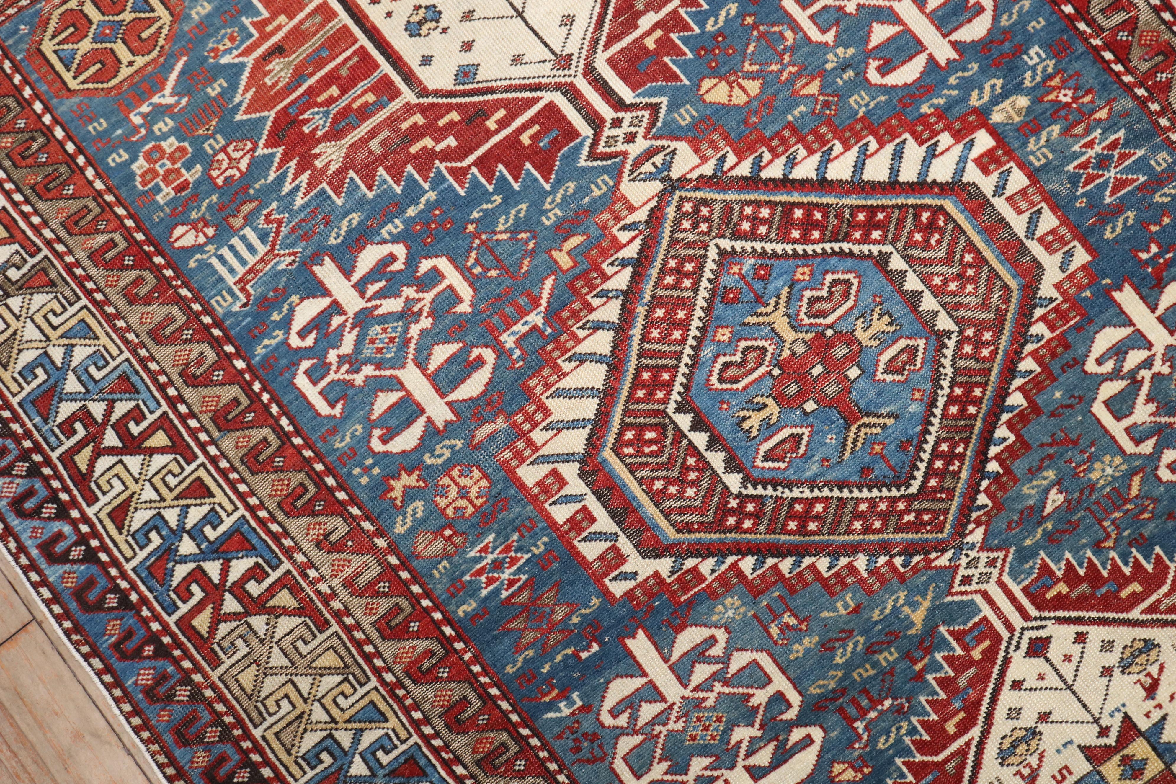 Zabihi Collection Tribal Blue 19th Century Antique Caucasian Shirvan Rug In Good Condition For Sale In New York, NY