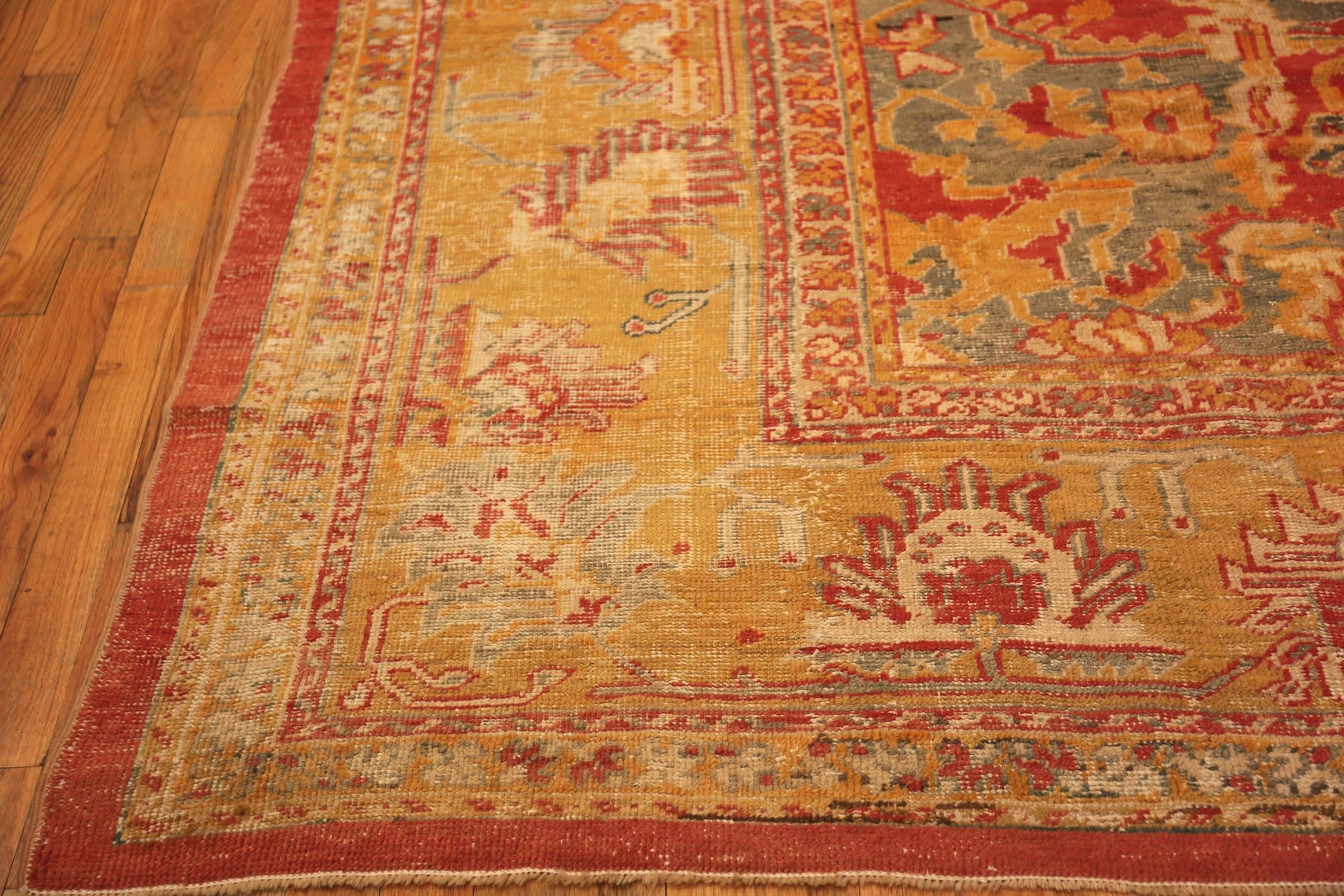 Bunter prächtiger antiker türkischer Ghiordes-Teppich mit Stammesmotiven 12'2