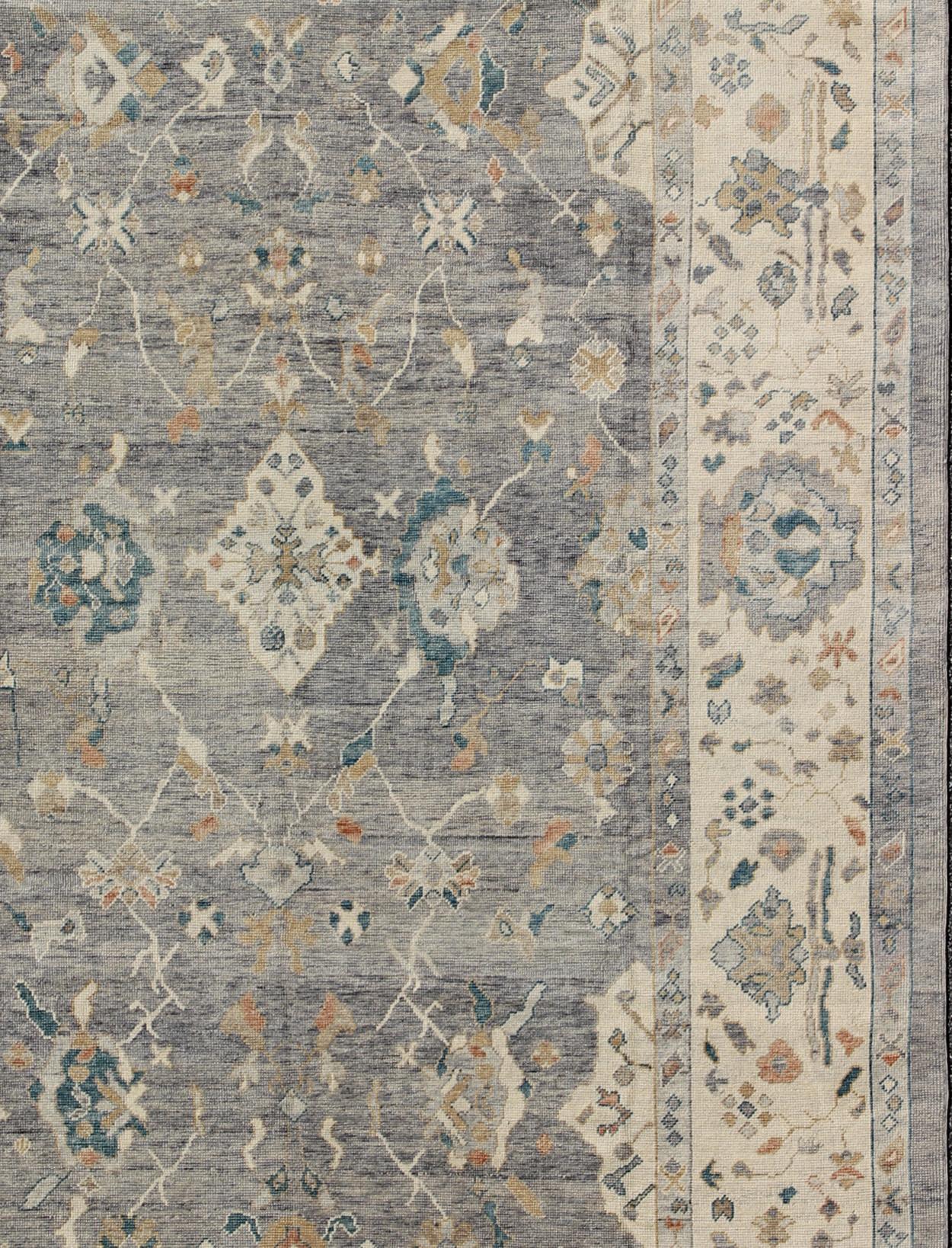 Measures: 10'3 x 14'3.
Turkish Oushak rug with bold design and color palette and all-over diamond medallion design. Tribal Design Turkish Oushak Rug with Gray and Multi Colors by Keivan Woven Arts / rug MSD-200, country of origin / type: Turkey /