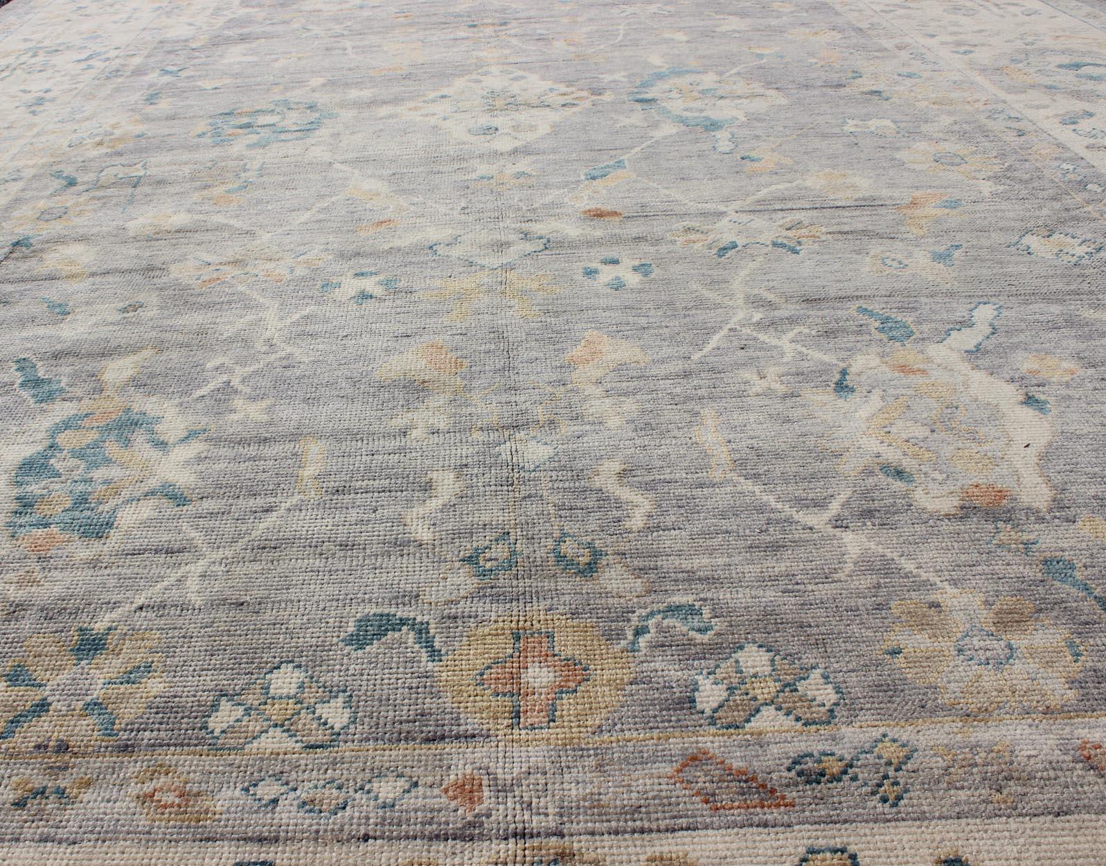 Contemporary Tribal Design Hand Knotted Turkish Oushak Rug with Gray and Multi Colors For Sale