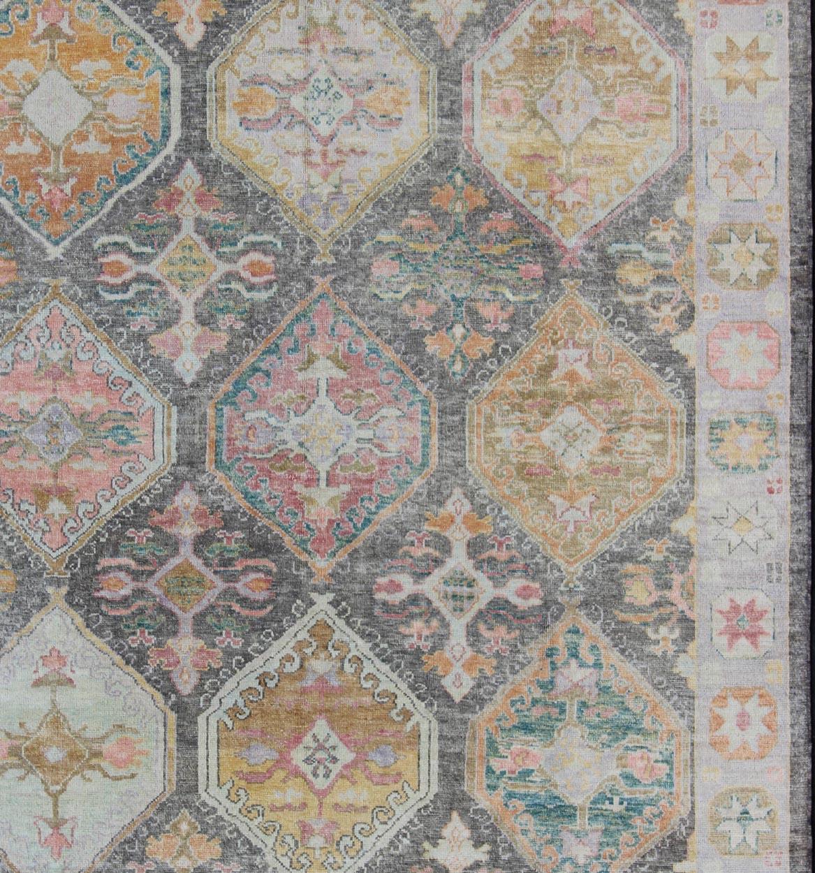 Turkish Oushak rug with bold design and color palette and all-over large diamond medallion design, rug EN-179696, country of origin / type: Turkey / Oushak

This unique design Oushak rug from Turkey features a bold design with fun color palette
