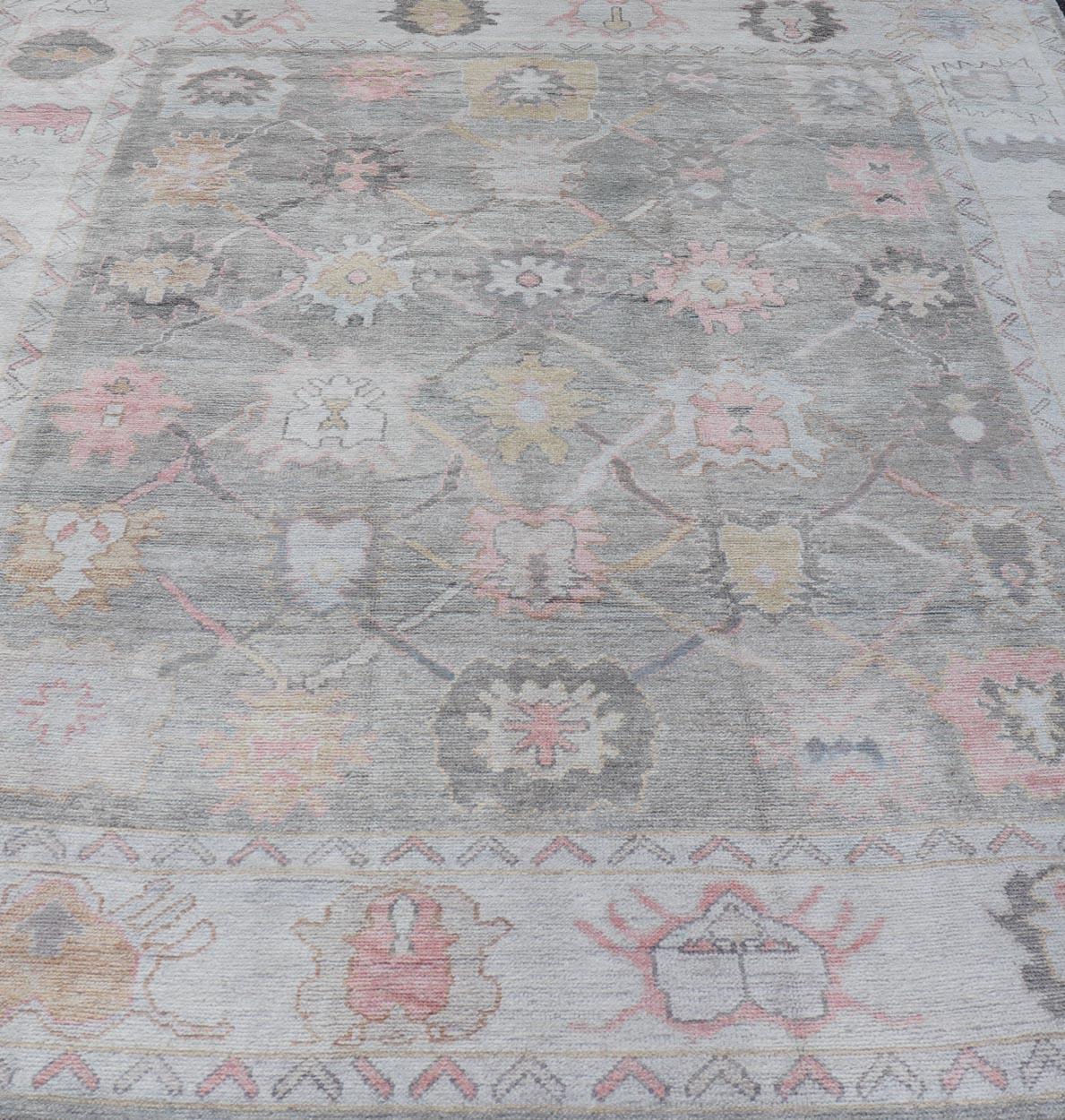 Wool Tribal Design Turkish Oushak Rug with Medallions in Light Green and Multi Colors For Sale