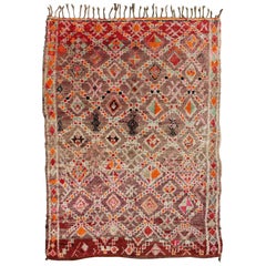 Tappeto marocchino vintage dal design tribale in arancione, rosso, verde e marrone chiaro