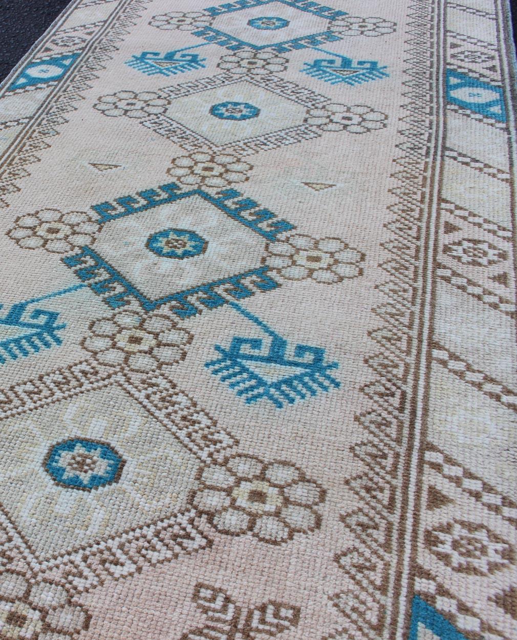 20th Century Tribal Design Vintage Turkish Oushak Runner with Blue, Teal, Taupe and Cream