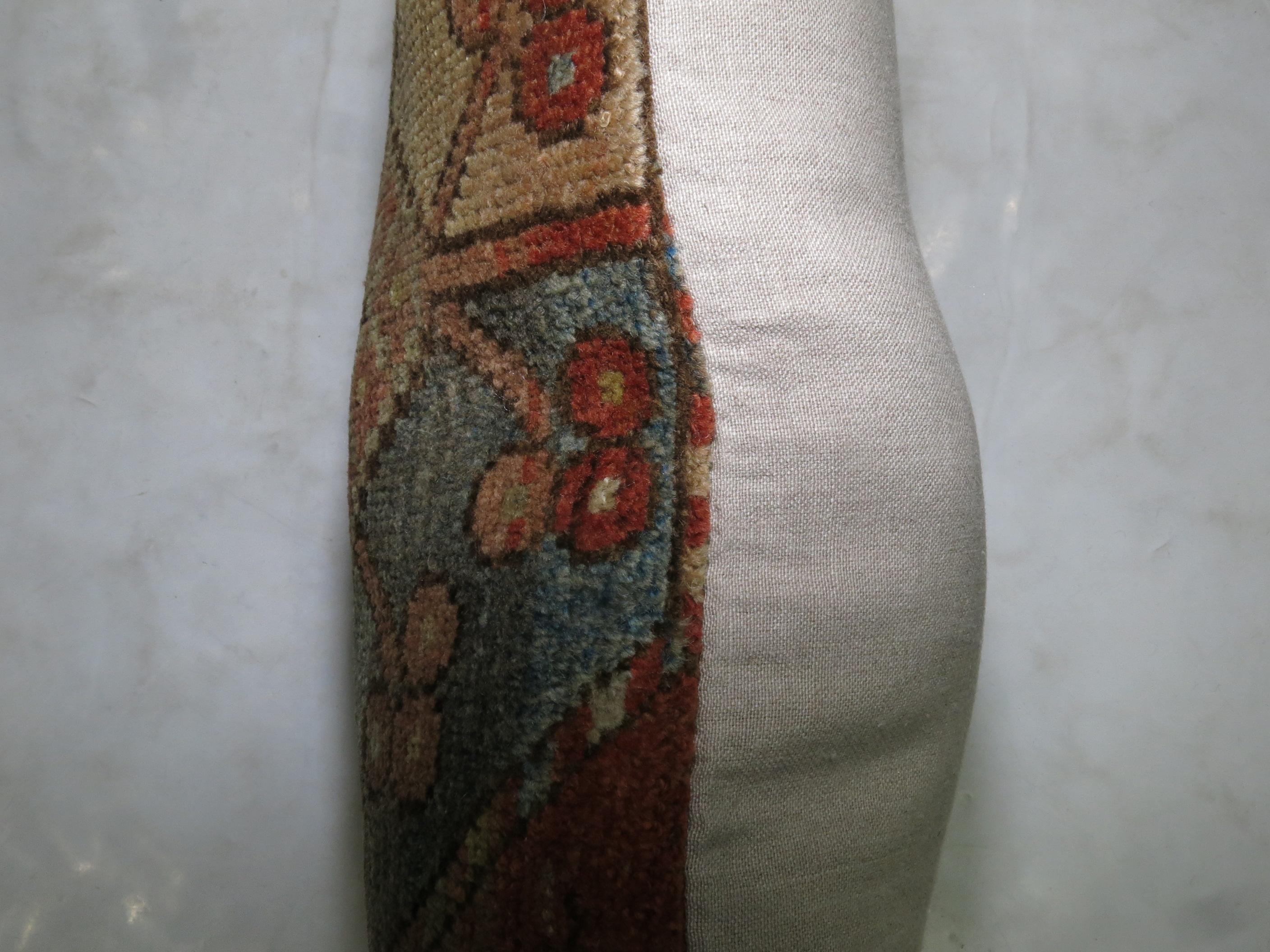 Pillow made from a 19th century antique Ersari rug with cotton back and zipper closure.