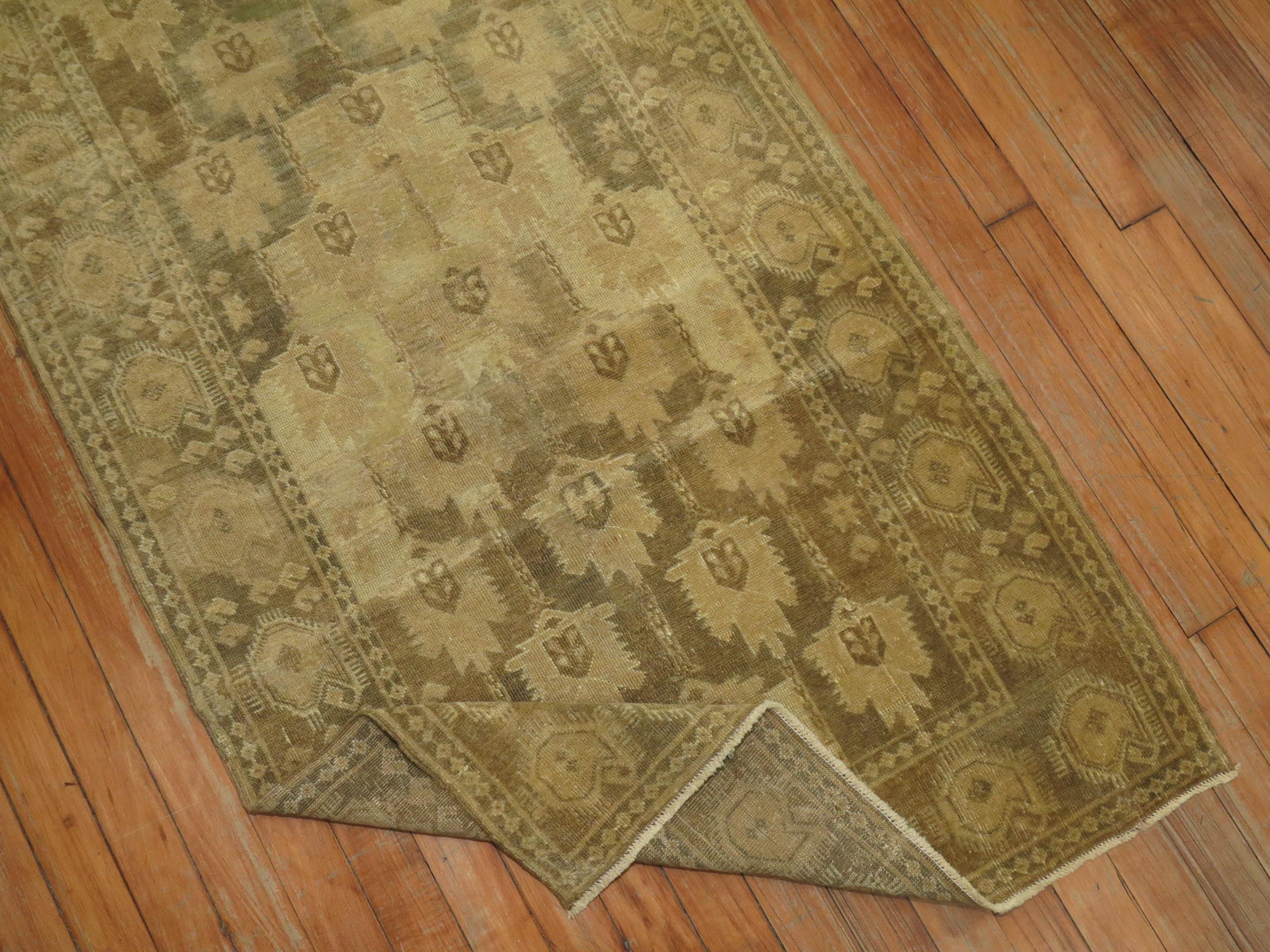 A mid-20th century decorative Ersari runner I muddy brown and taupe.