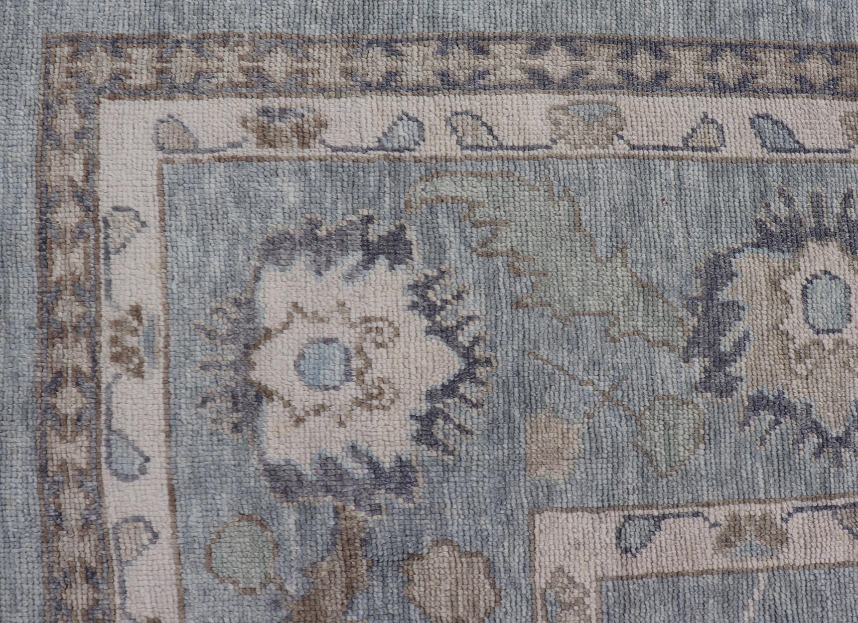 Tribal Floral Design Hand Knotted Turkish Oushak Rug with Blues and Brown For Sale 5