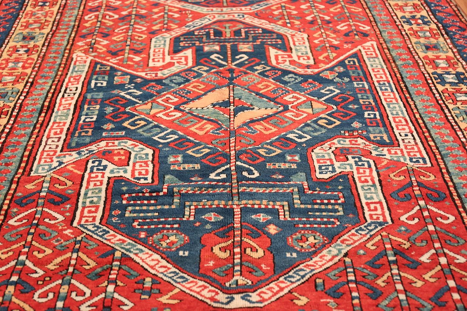 Gallery size runner antique Tribal Caucasian Kazak rug, Country of origin / rug Type: Caucasian rugs, Circa date: 1900. Size: 5 ft 6 in x 11 ft (1.68 m x 3.35 m)

 