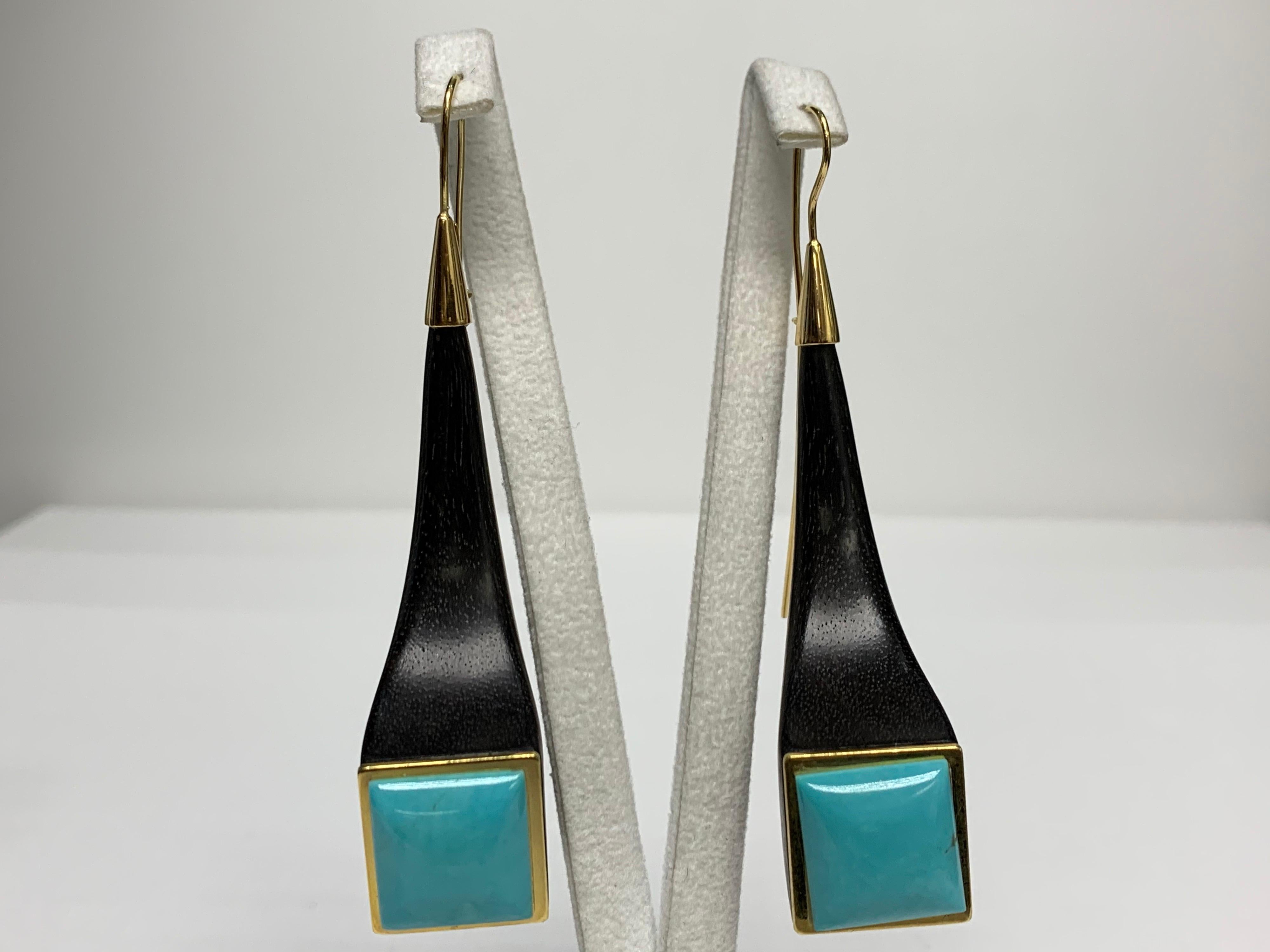 Ebony Wood and Turquoise Earrings from Italy. 

Featuring Turquoise Stone Earrings, Ebony Wood Hand Carved from Italy. 

This one-of-a-kind pair of earrings was created by hand is certified, appraisal included, 100% insured. Processed and shipped