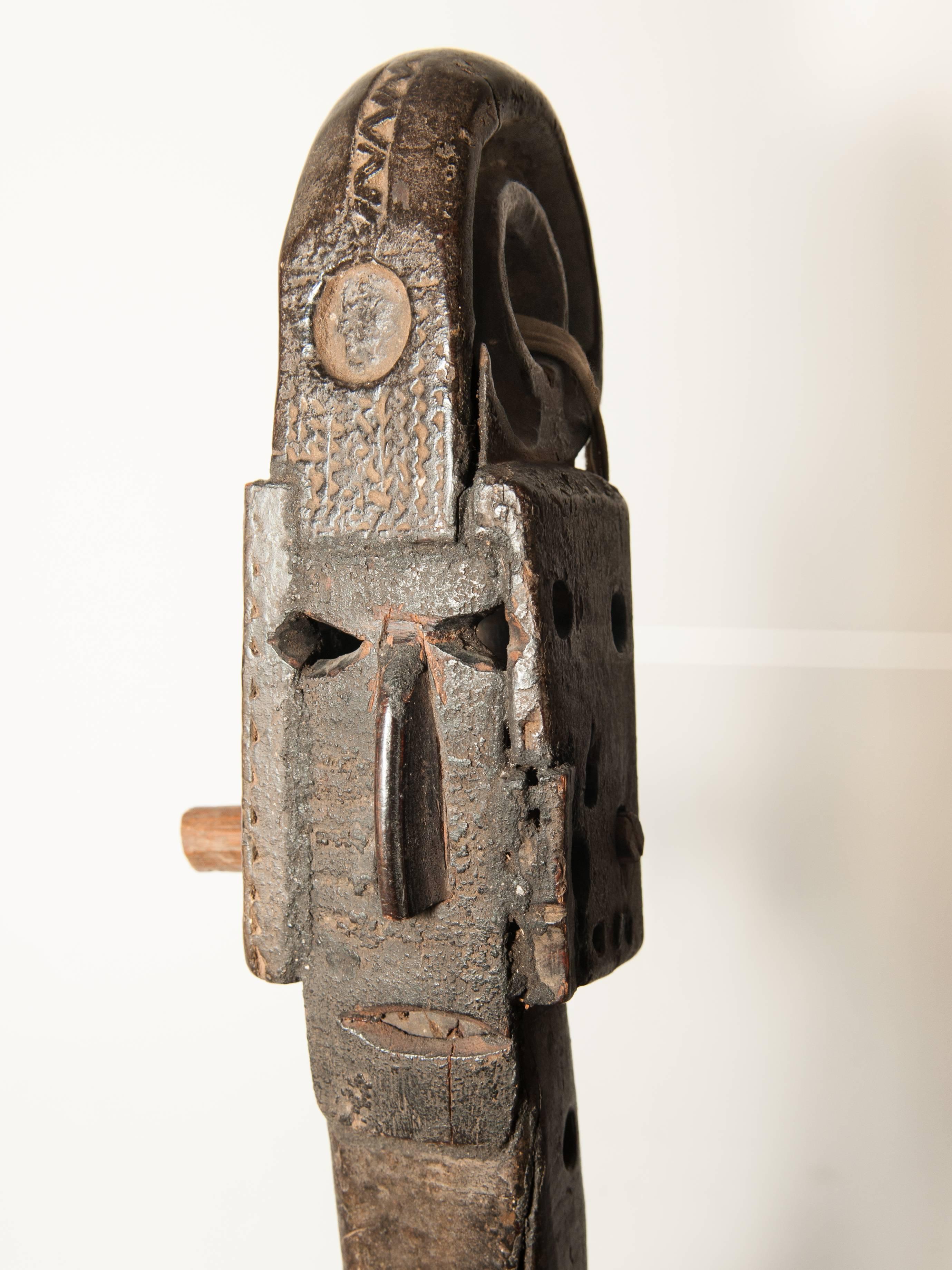 Tribal hand-carved Lute or Sarangi. Likely from the Gaine caste of wandering musicians from the Nepal Himalaya region, early 20th century.
This form of the lute with this particular rendering of the human face, and with the pinched waist, is
