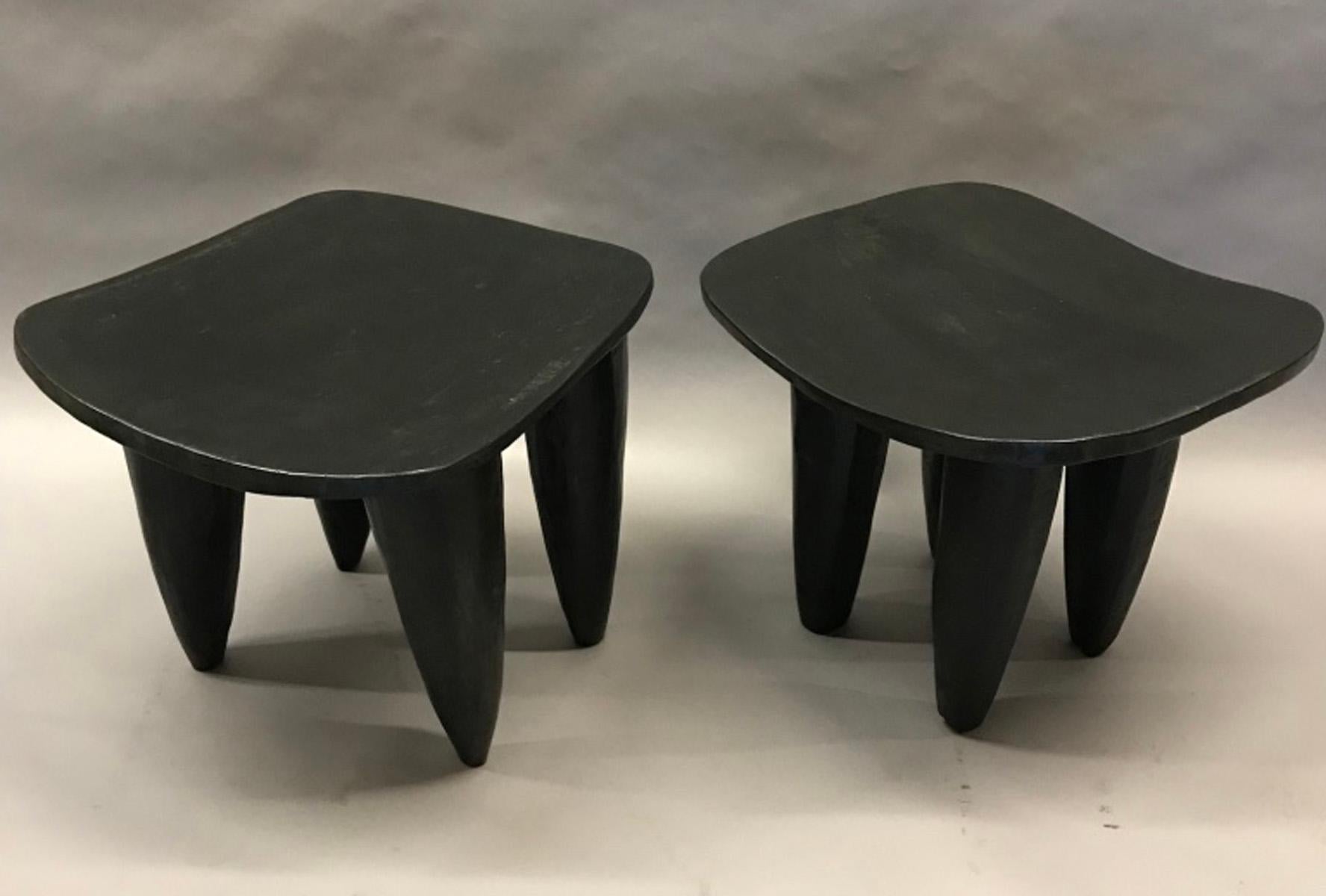 Two hand carved stools or small side tables from the Senufo tribe of Mali. Dark finish. Each stool is hand carved out of one piece of wood, early 20th century. Sold and priced separately
Left measures: 26.5 x 22.75 x 20 H
Right measures: 25.75 x
