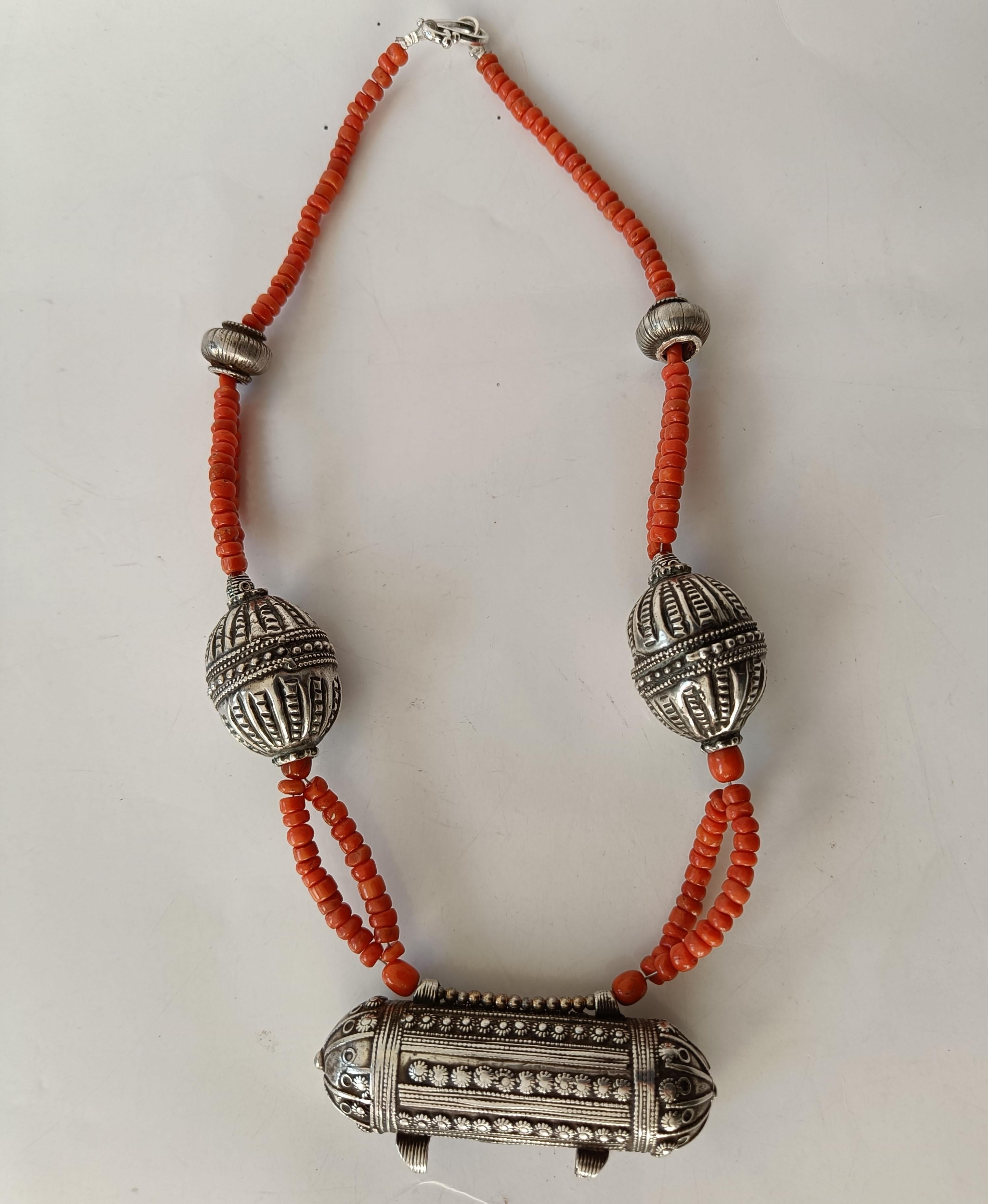 Long Large Silver bead and coral necklace Yemen 
Double row coral with large silver beads 
Period: Early/mid-20th century.
Overall length 32 inches, 81 cm
Silver bead size 1 3/4 x 1  1/4 inches 4.5 x 3 cm#
coral beads 3-4 mm
 