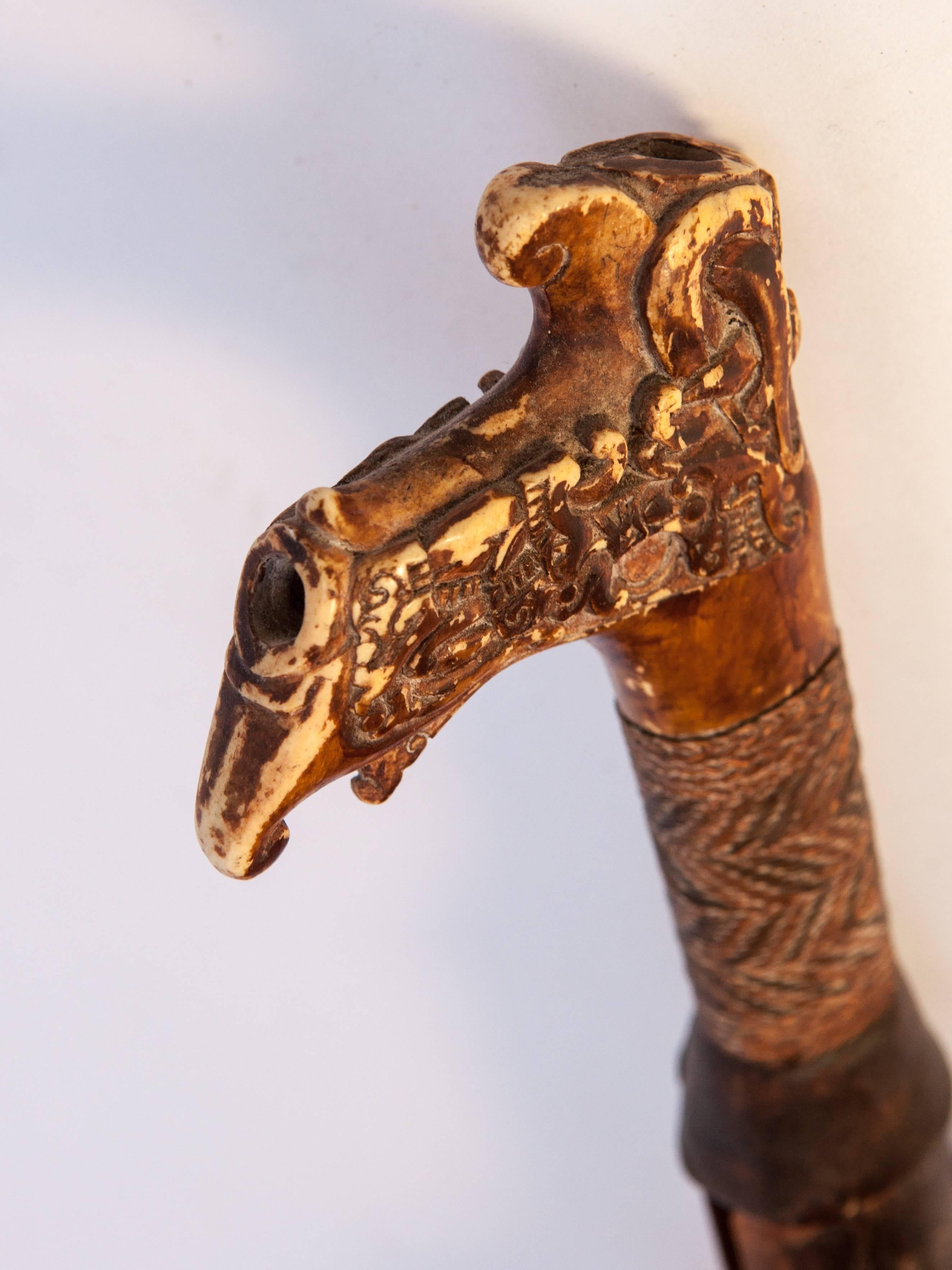 Hand-Carved Tribal Mandau Sword with Scabbard from the Dayak of Borneo, Early 20th Century