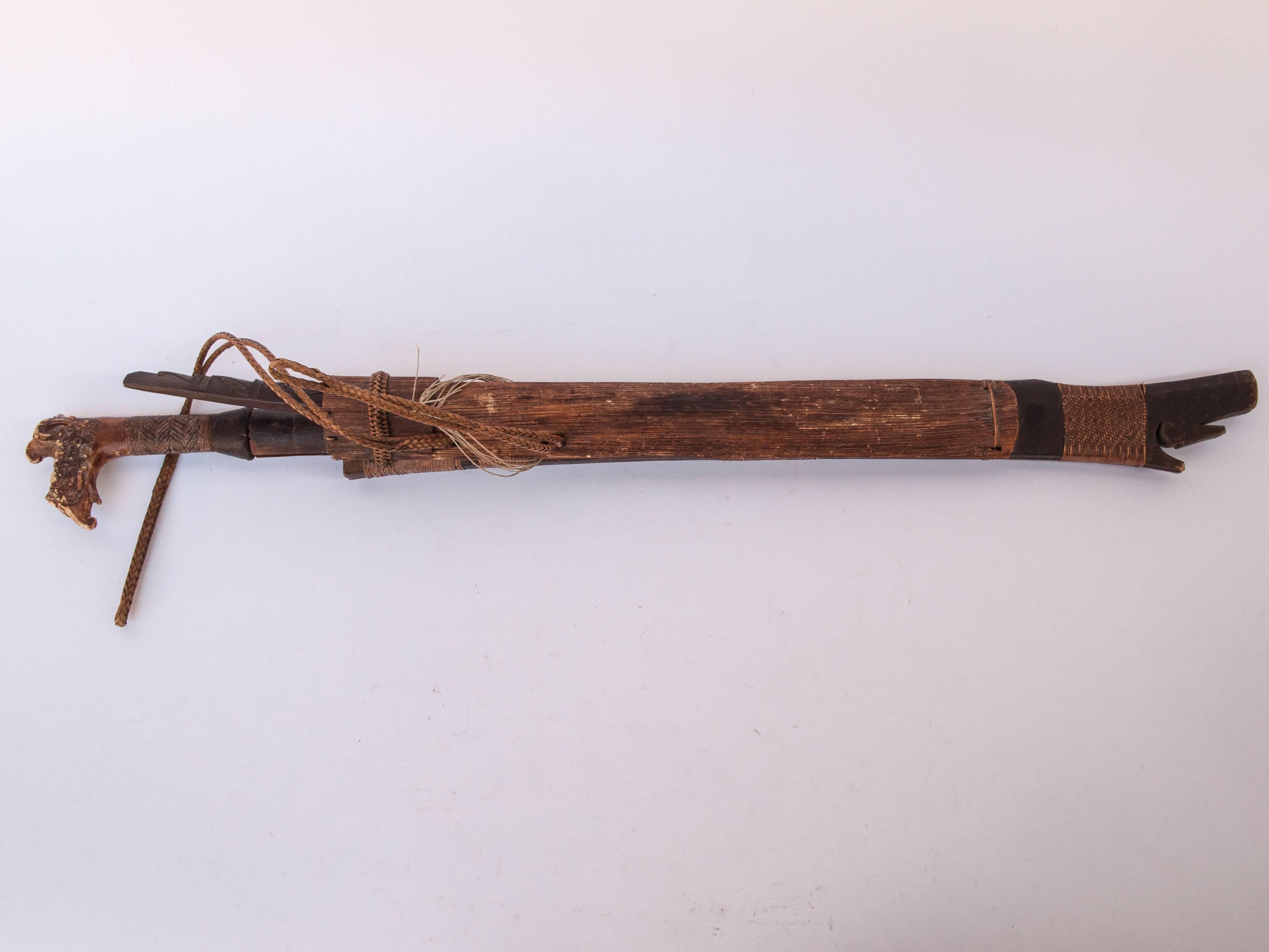Steel Tribal Mandau Sword with Scabbard from the Dayak of Borneo, Early 20th Century