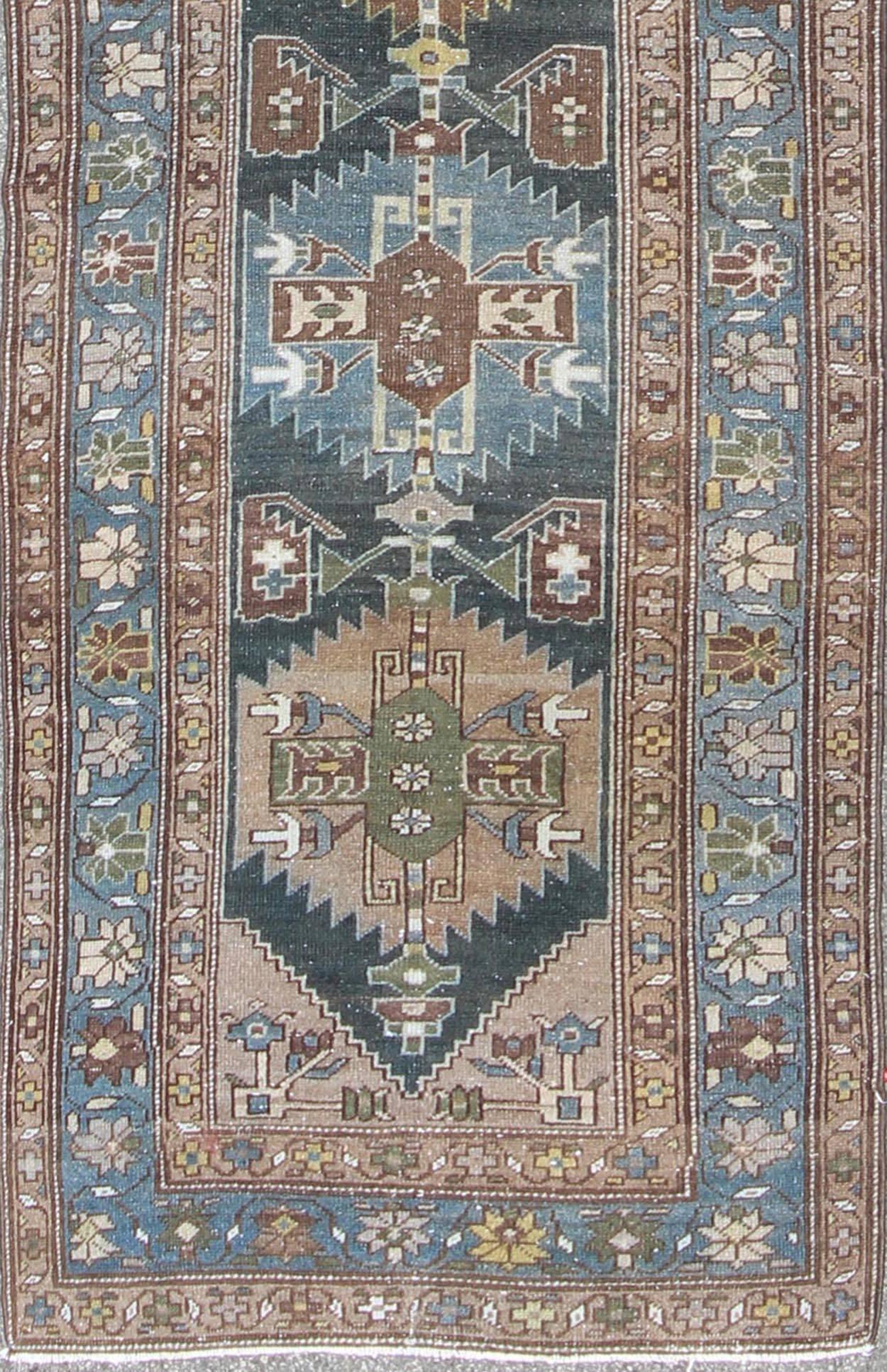 Tribal medallion antique Persian Hamedan runner in tan, taupe, and blue tones, rug na-170118, country of origin / type: Iran / Hamedan, circa 1920

This antique Persian Hamedan gallery rug (circa early 20th century) features a unique blend of