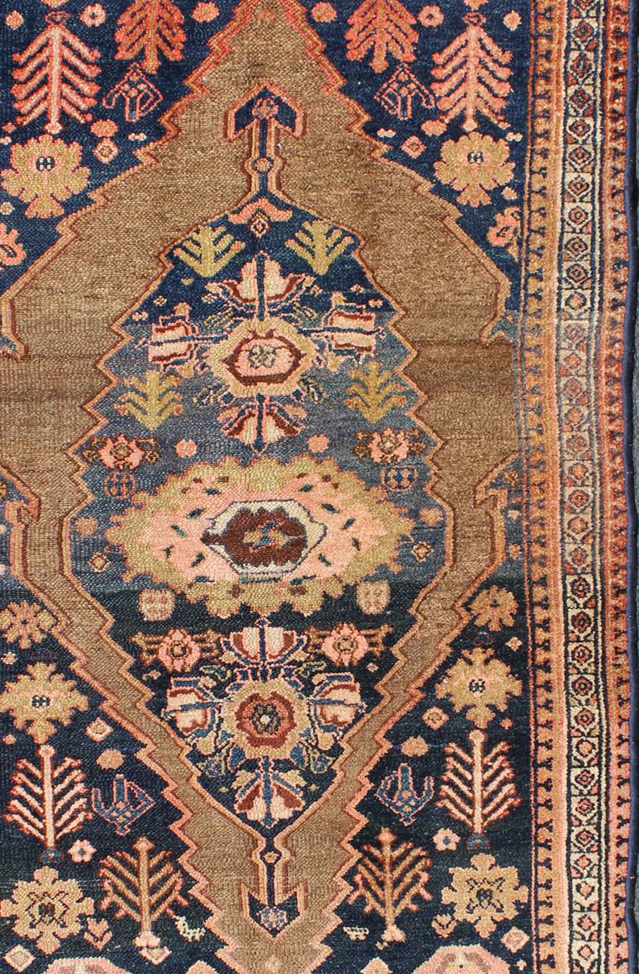 Tribal Medallion Design Antique Persian Serab Rug in Camel and Shades of Blue In Good Condition For Sale In Atlanta, GA