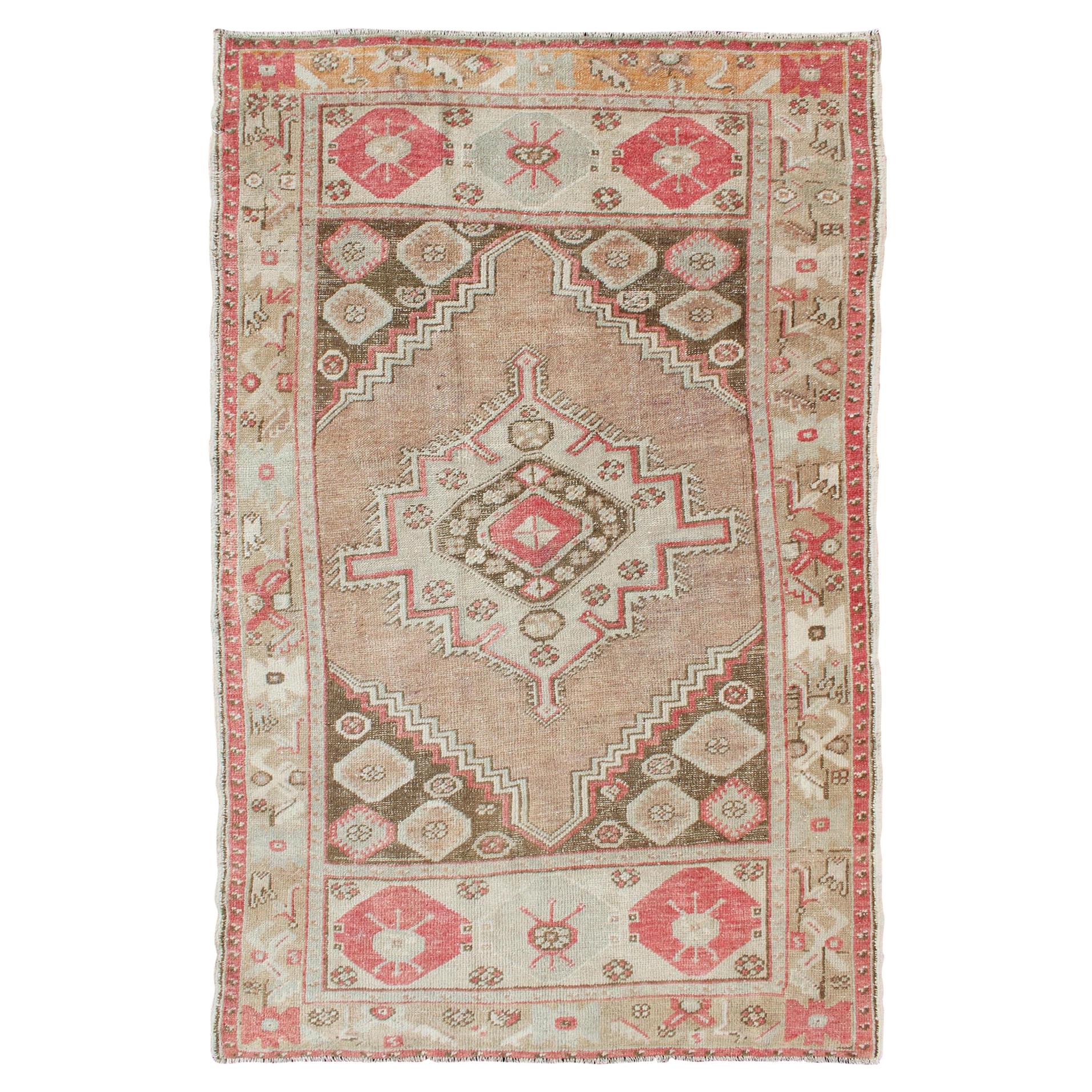 Tribal Medallion Design Vintage Turkish Oushak Rug in Earth Tones & Coral Pink