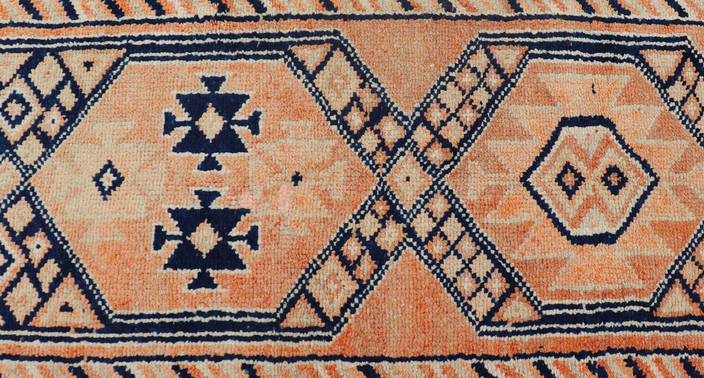 20th Century Tribal Medallion Design Vintage Turkish Runner in Orange and Navy Blue For Sale