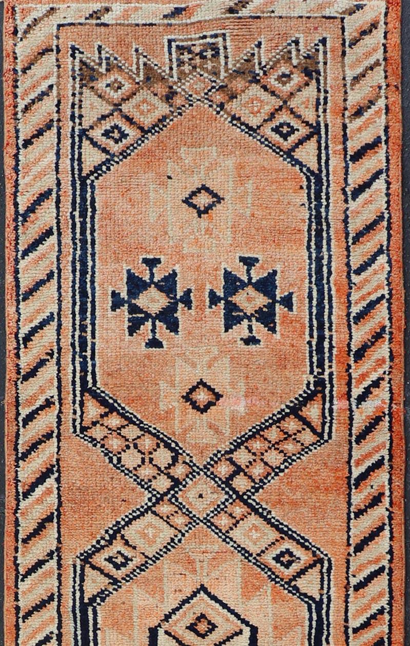 Wool Tribal Medallion Design Vintage Turkish Runner in Orange and Navy Blue For Sale