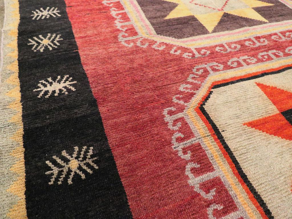 Wool Tribal Mid-20th Century Handmade Turkish Anatolian Accent Carpet in Red & Black