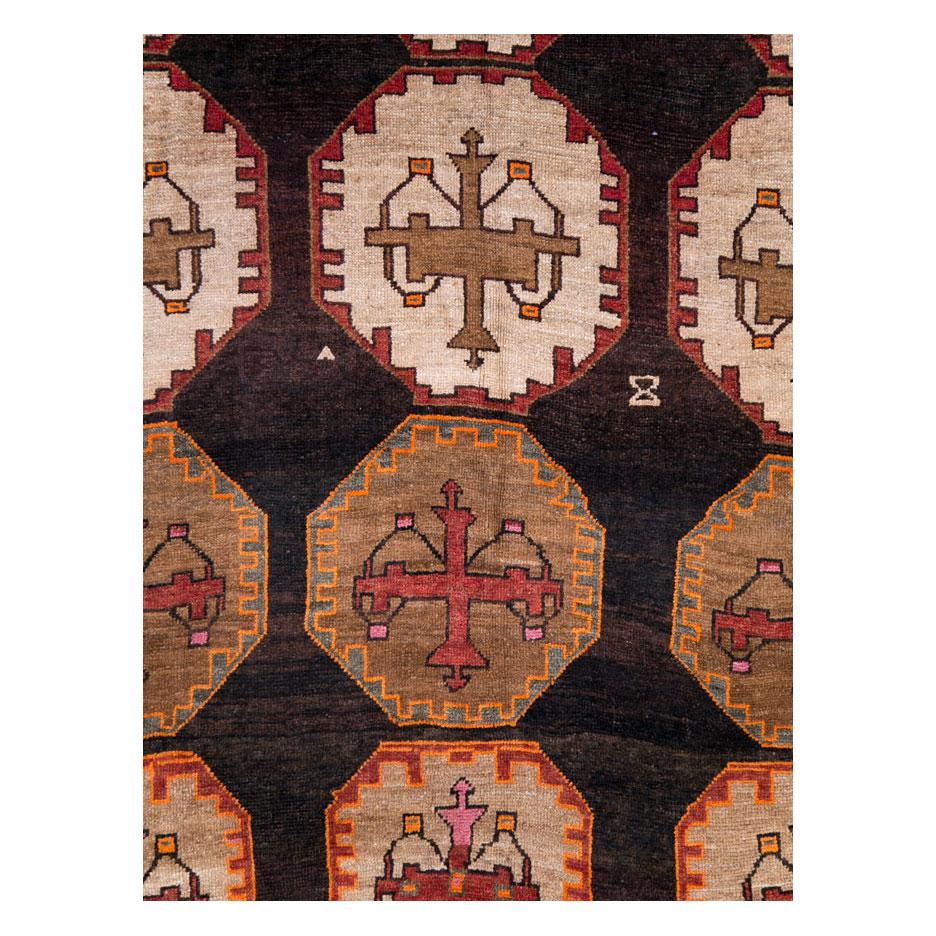 Tapis vintage turc anatolien de taille normale avec un motif tribal, fabriqué à la main au milieu du 20e siècle.

Mesures : 7' 9